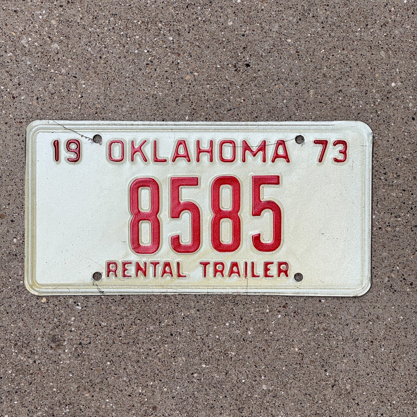 Photo of a 1973 Oklahoma Rental Trailer License Plate Auto Tag Garage Decor Vintage 8585