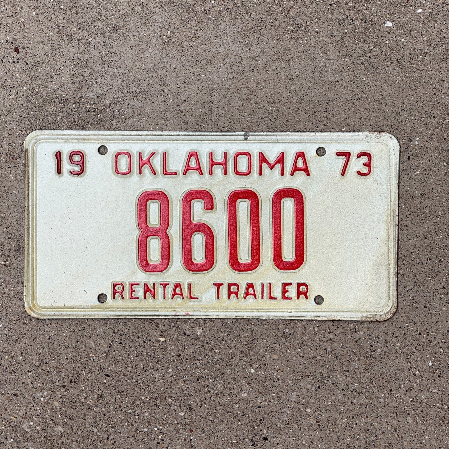 Photo of a 1973 Oklahoma Rental Trailer License Plate Auto Tag Garage Decor Vintage 8600