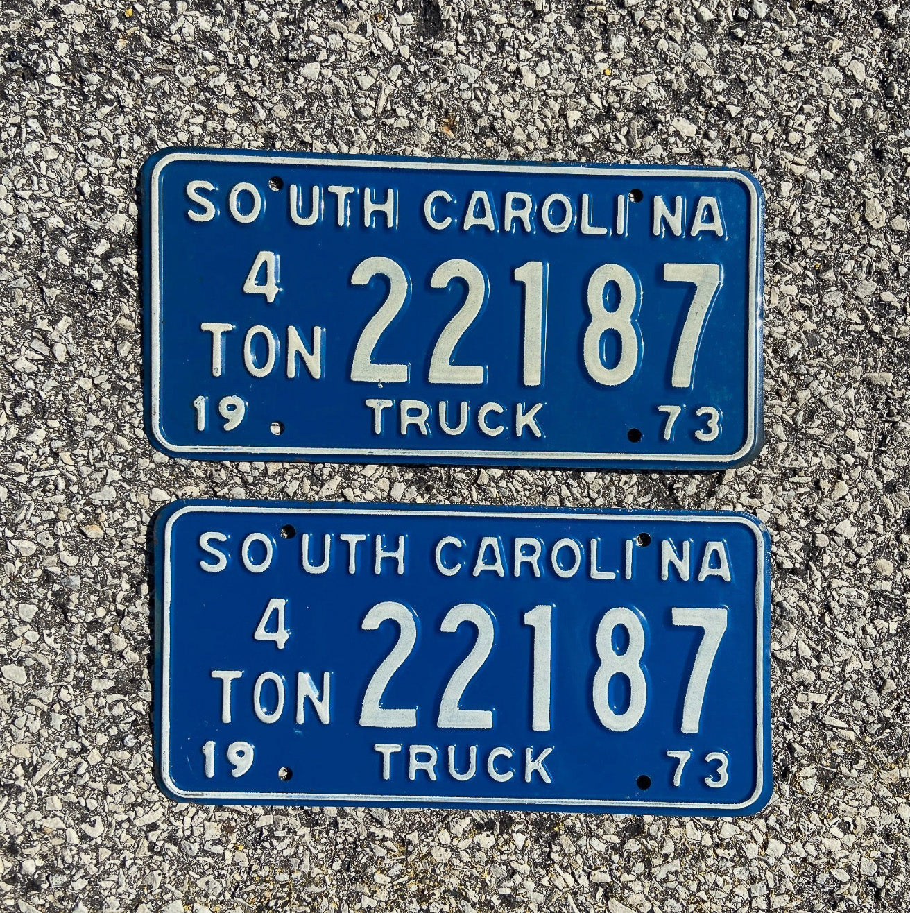 Photo of a 1973 South Carolina Truck License Plate Pair Auto Tag Garage Decor Vintage 4 Ton 22187 with original patina
