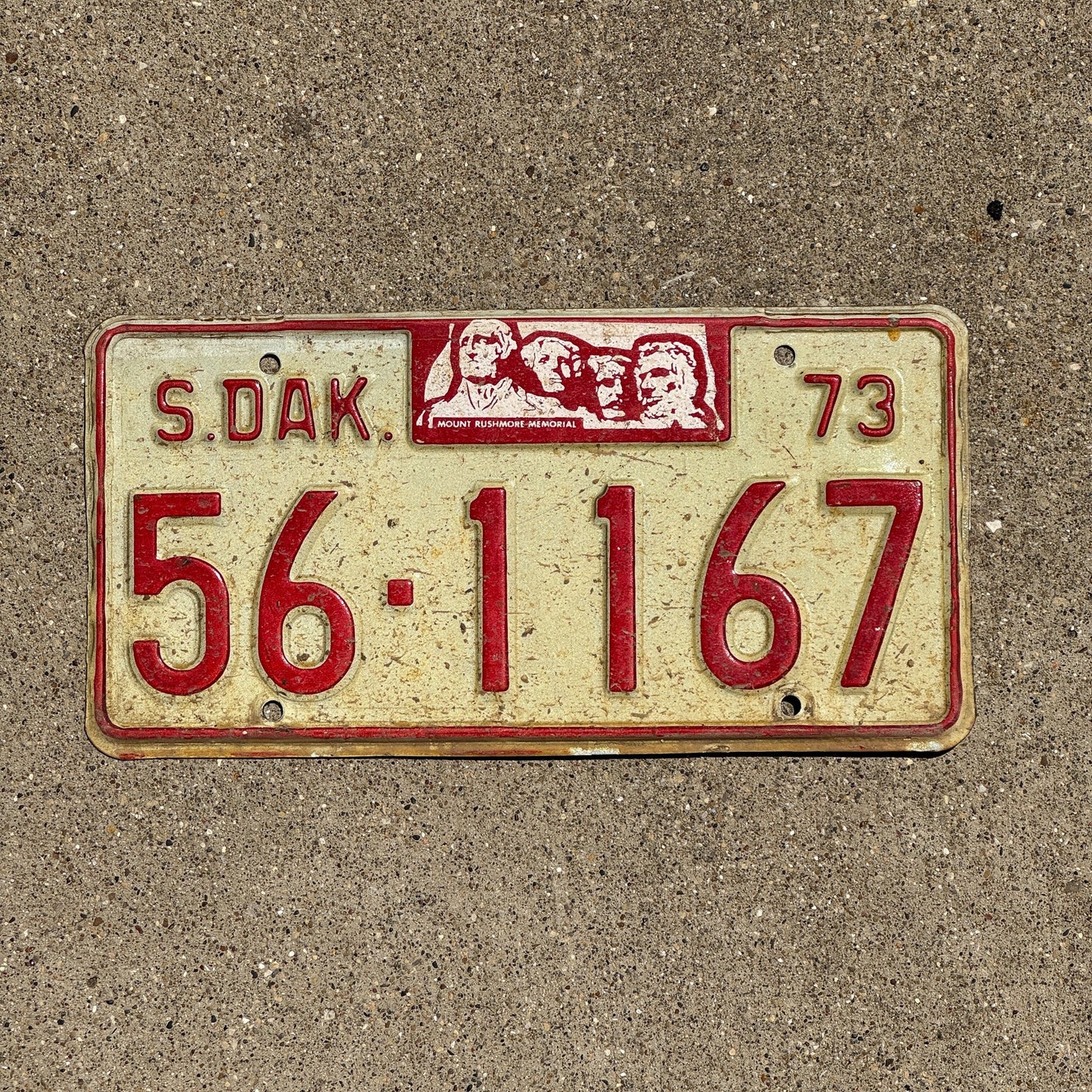 Photo of a 1973 South Dakota License Plate Auto Tag Garage Decor Vintage Sanborn 56 1167