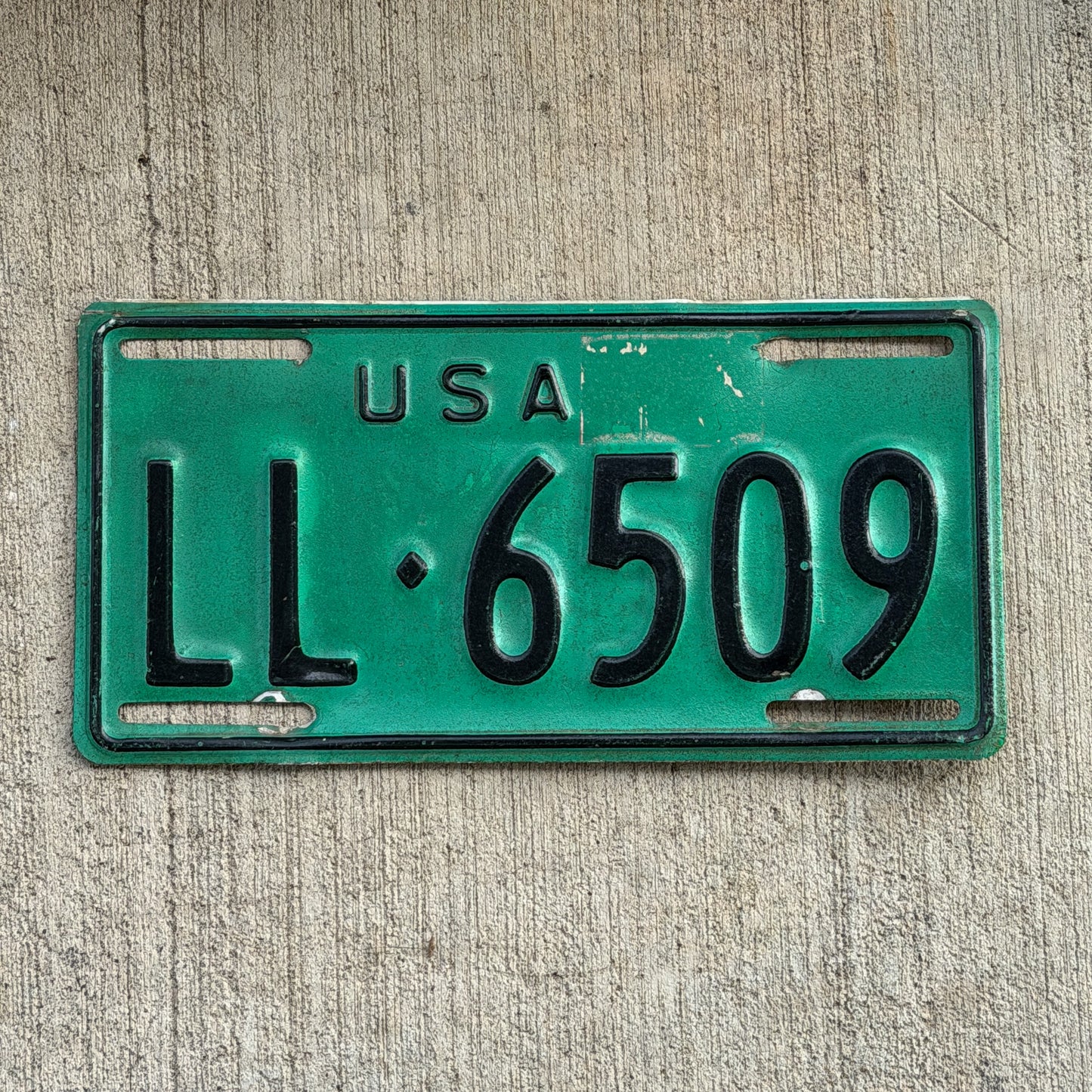 Photo of a 1973 US Forces Germany License Plate Auto Tag Garage Decor Vintage LL 6509 with original patina