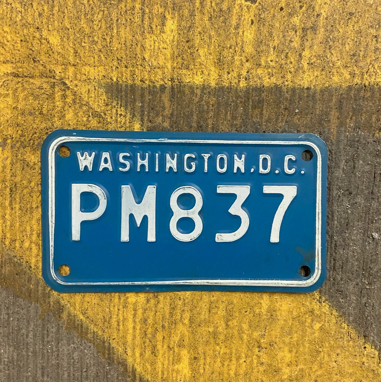 Photo of a 1973 Washington DC Police Motorcycle License Plate Auto Tag Garage Decor Vintage Hard to Find Type 1 PM 837 with original patina