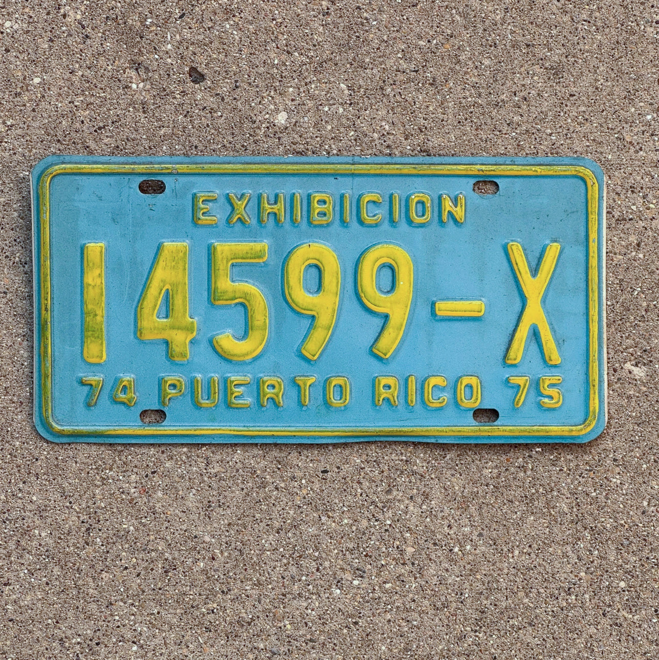 Photo of a 1974 1975 Puerto Rico Exhibicion License Plate Auto Tag Garage Decor Vintage US Territory 14599 X with original patina