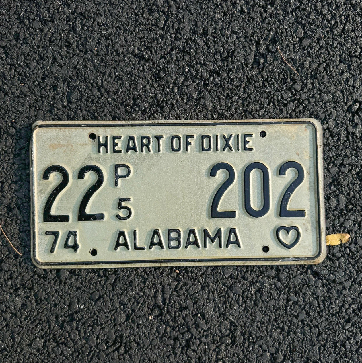 Photo of a 1974 Alabama Truck License Plate Auto Tag Garage Decor Vintage Heart of Dixie 22 202