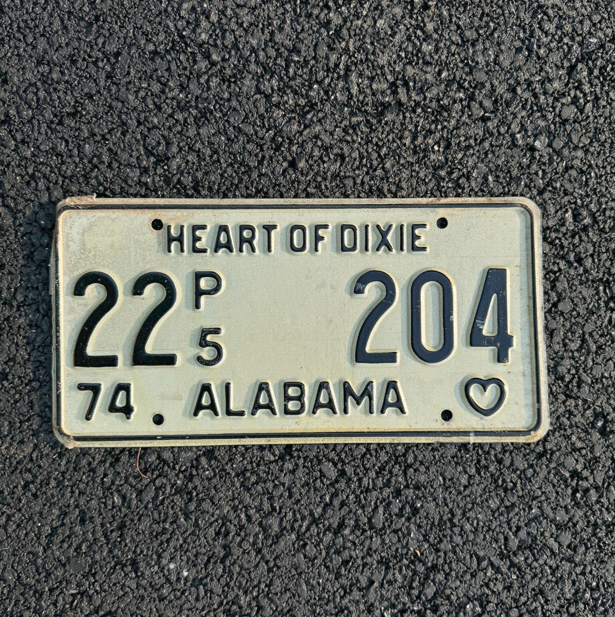 Photo of a 1974 Alabama Truck License Plate Auto Tag Garage Decor Vintage Heart of Dixie 22 204