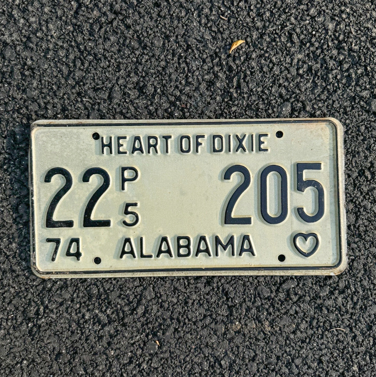 Photo of a 1974 Alabama Truck License Plate Auto Tag Garage Decor Vintage Heart of Dixie 22 205