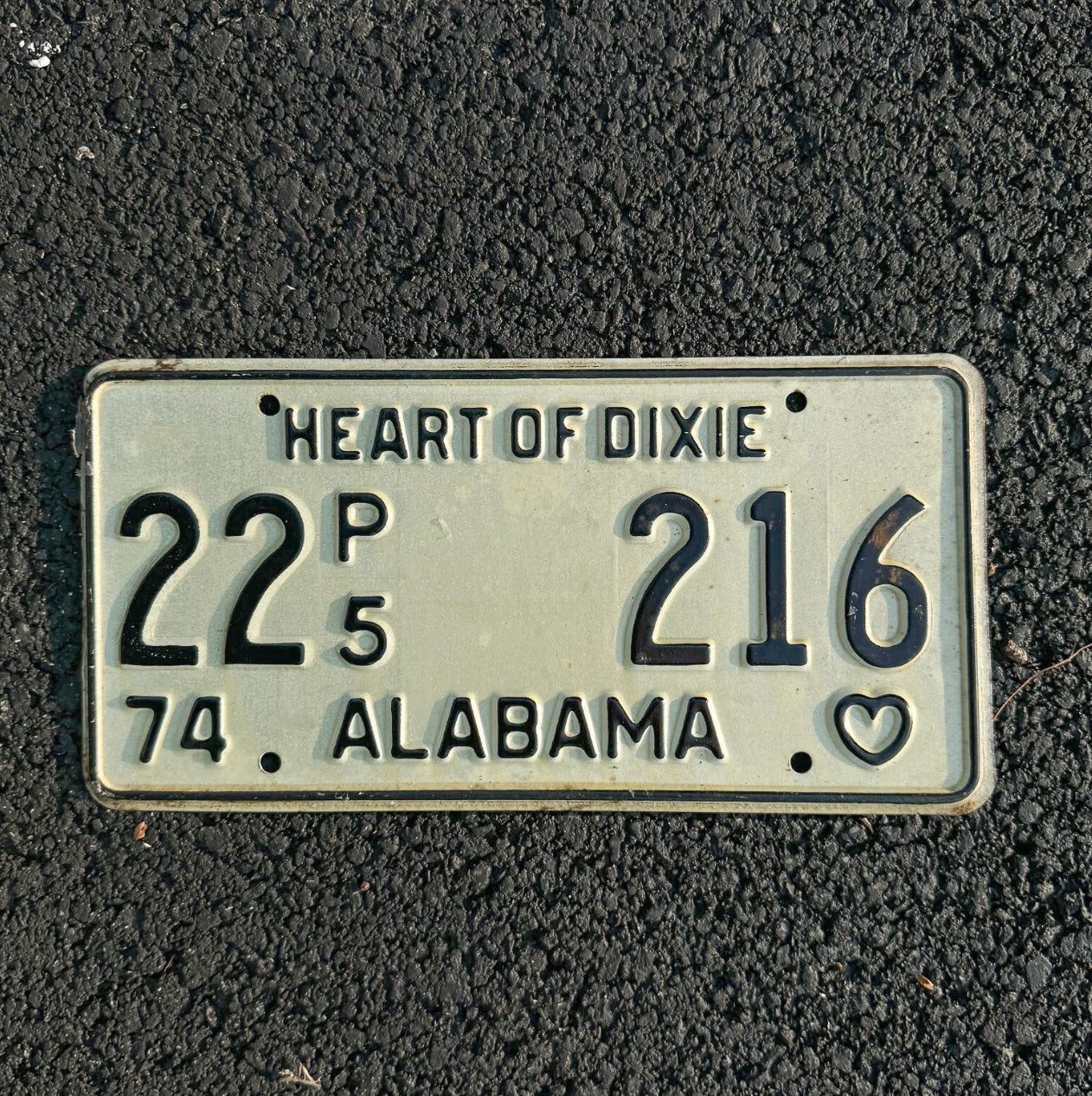 Photo of a 1974 Alabama Truck License Plate Auto Tag Garage Decor Vintage Heart of Dixie 22 216