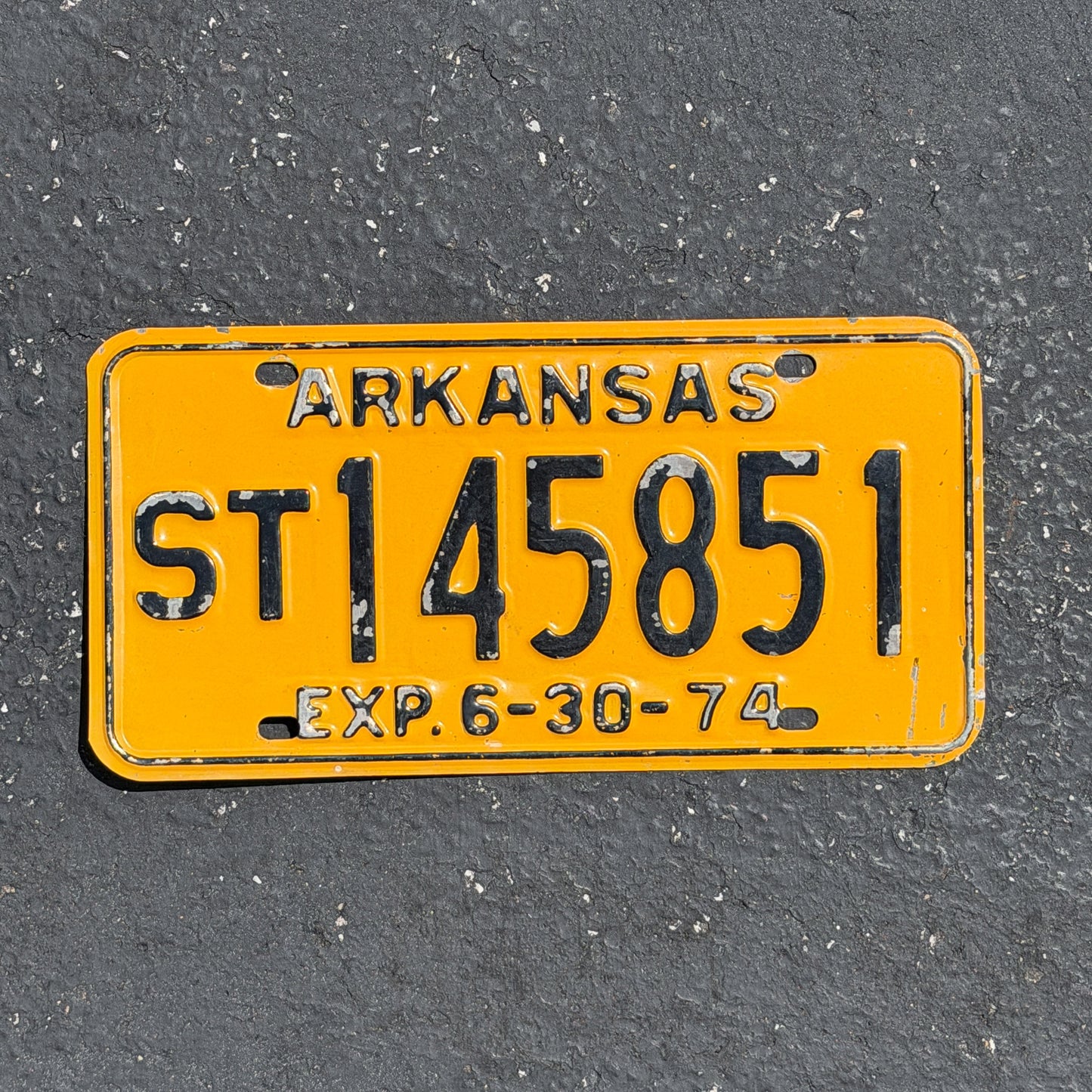 Photo of a 1974 Arkansas Semi Trailer License Plate Auto Tag Garage Decor Vintage ST 145851 with original patina