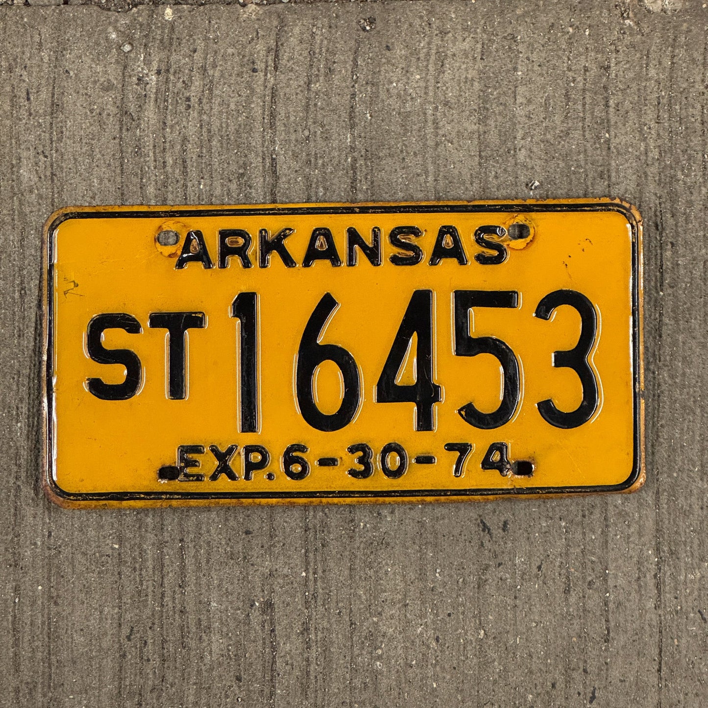 Photo of a 1974 Arkansas Semi Trailer License Plate Auto Tag Garage Decor Vintage ST 16453