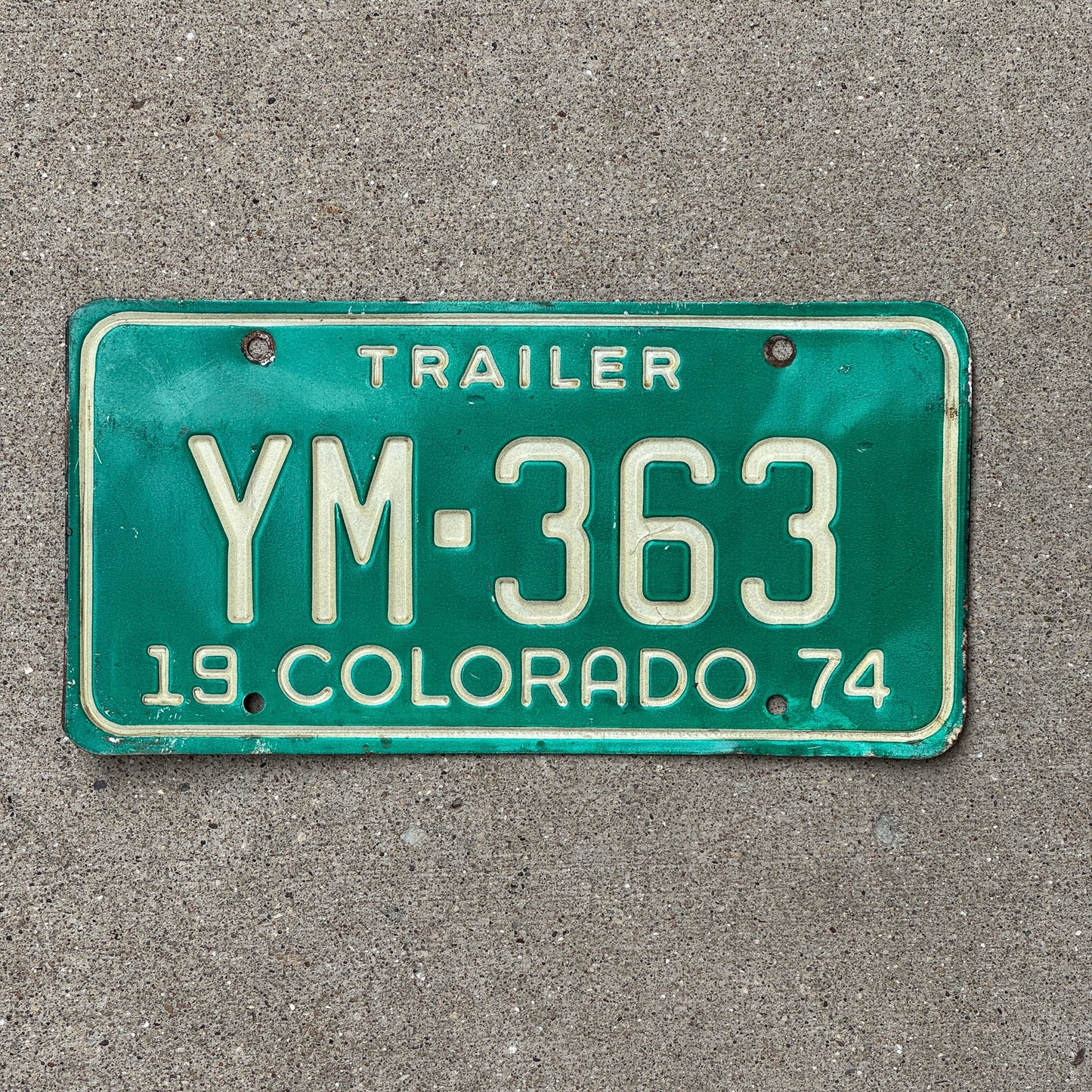 Photo of a 1974 Colorado Trailer License Plate Auto Tag Garage Decor Vintage YM 363