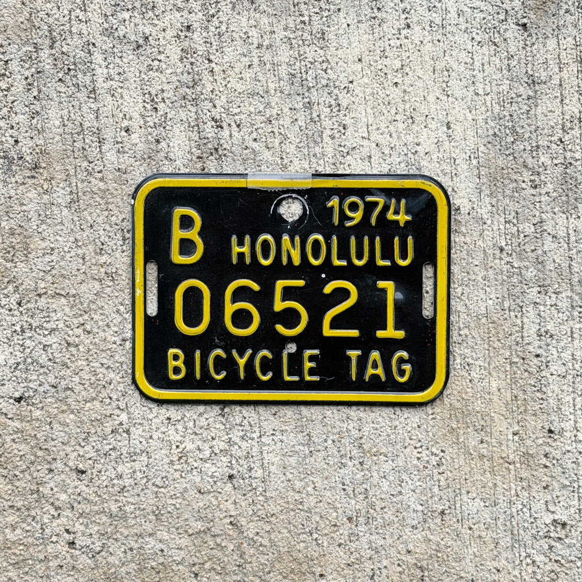 Photo of a 1974 Honolulu Hawaii Bicycle License Plate Auto Tag Garage Decor Vintage Bike B 06521 with original patina