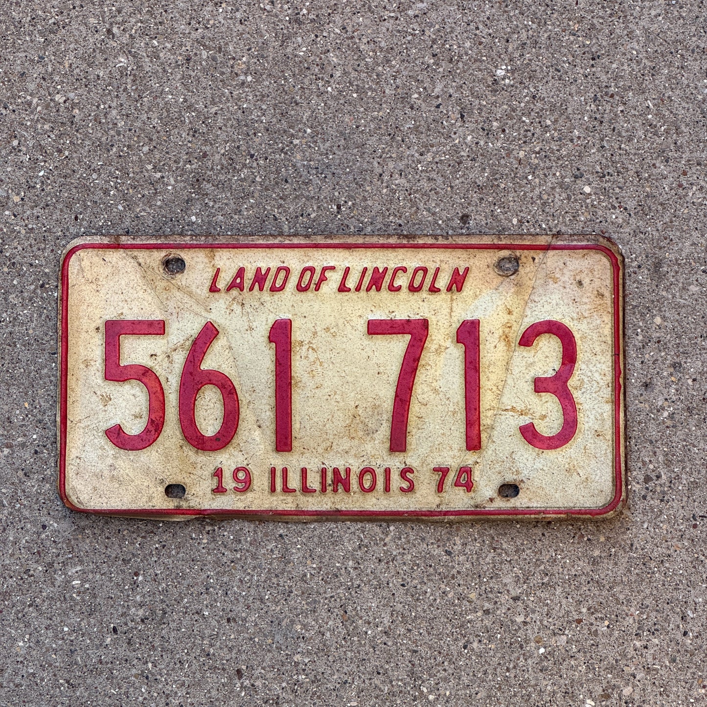 Photo of a 1974 Illinois License Plate Auto Tag 2 Vintage Garage 561 713 with original patina