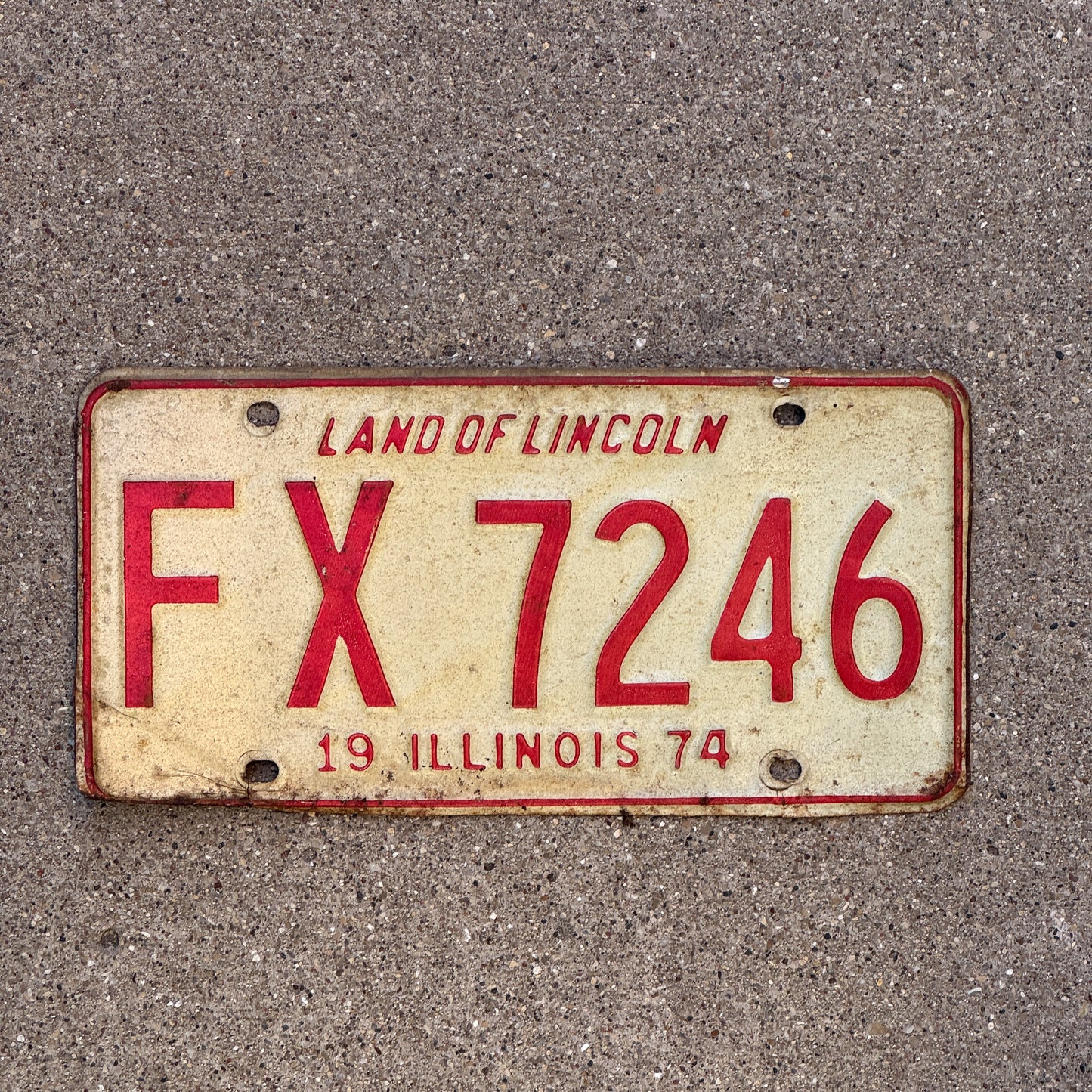 Photo of a 1974 Illinois License Plate Auto Tag 2 Vintage Garage FX 7246 with original patina