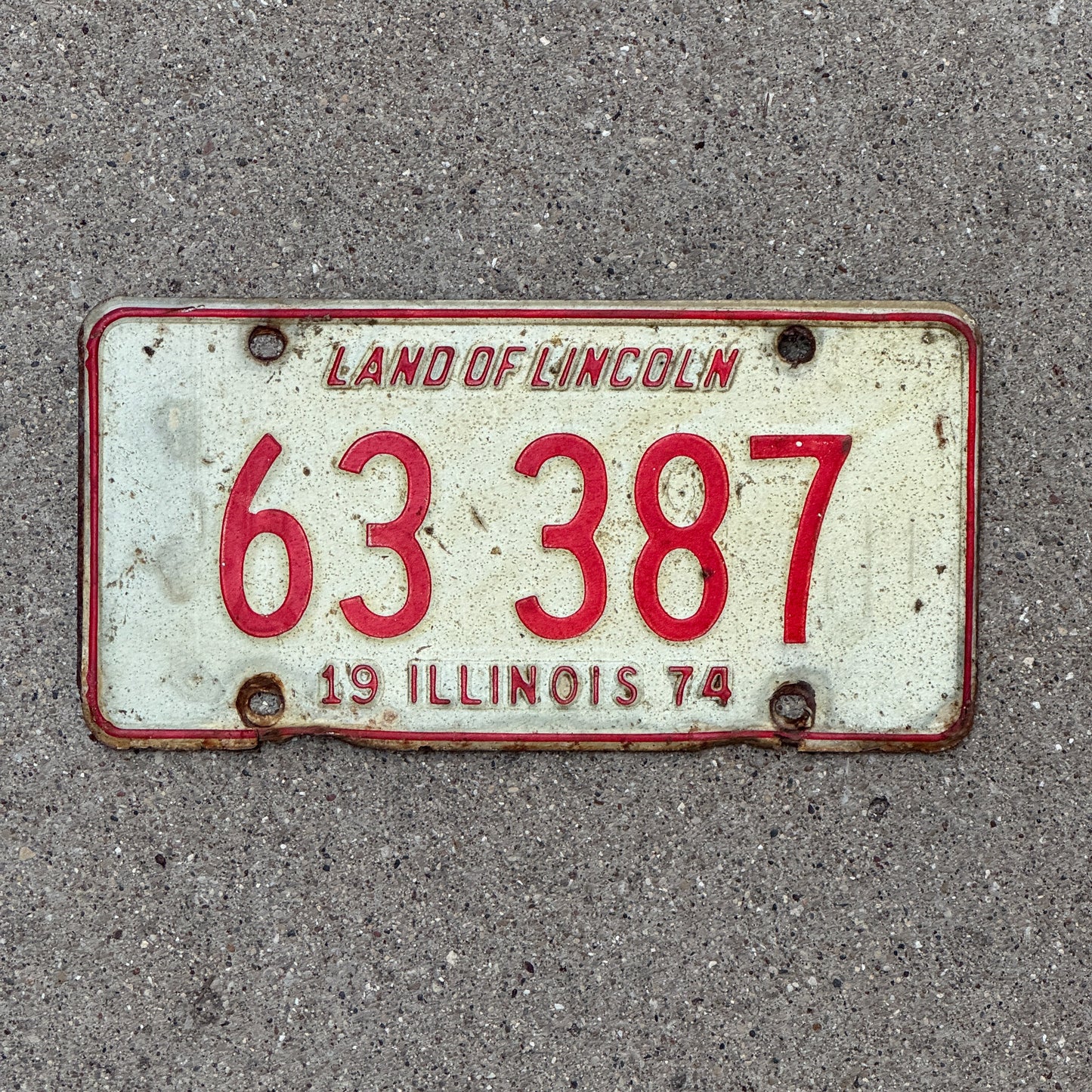Photo of a 1974 Illinois License Plate Auto Tag Garage Decor Vintage 63 387 with original patina
