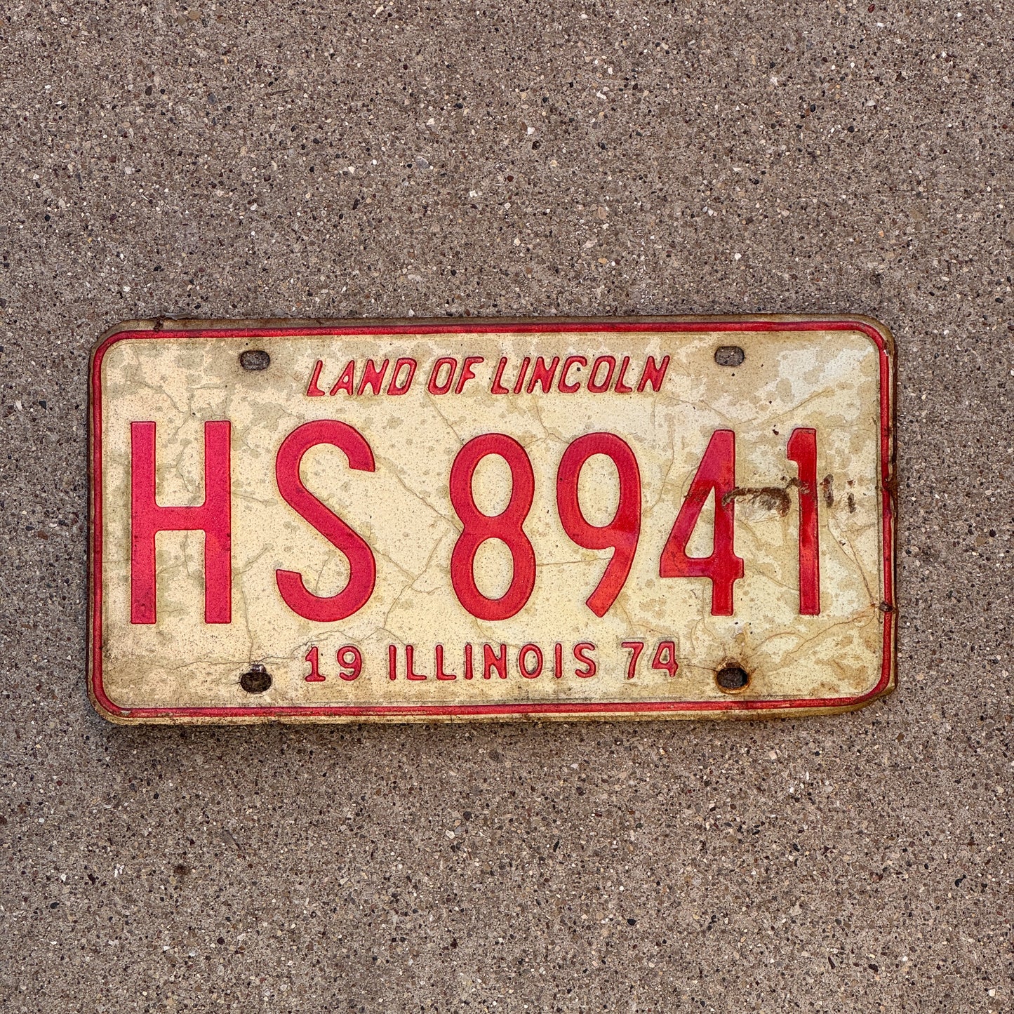 Photo of a 1974 Illinois License Plate Auto Tag Garage Decor Vintage HS 8941 with original patina