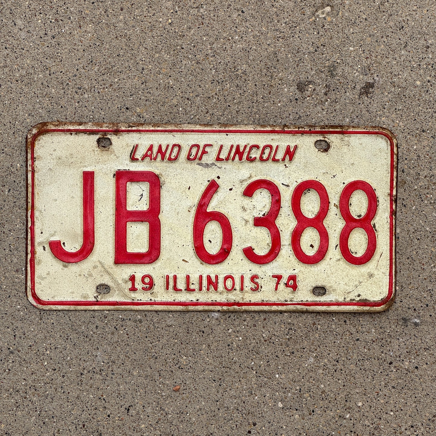 Photo of a 1974 Illinois License Plate Auto Tag Garage Decor Vintage JB 6388 with original patina