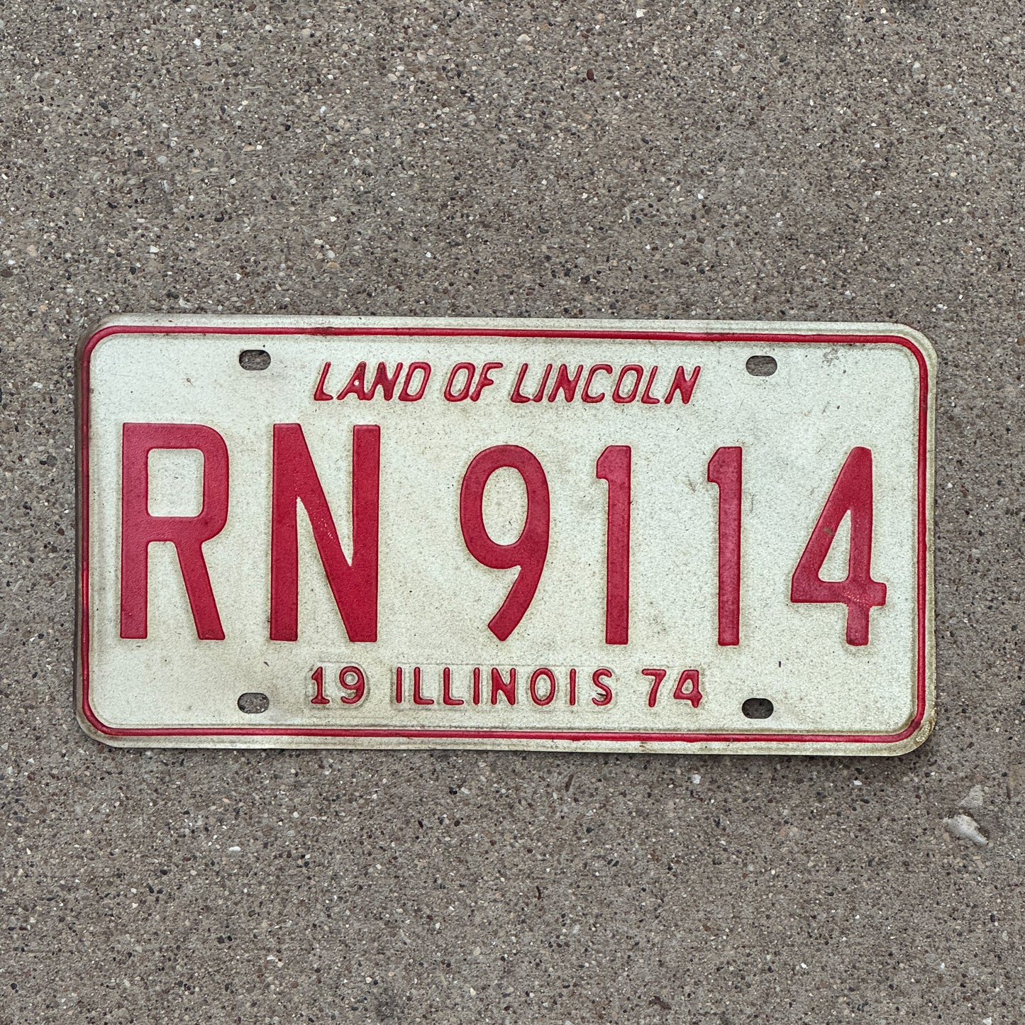 Photo of a 1974 Illinois License Plate Auto Tag Garage Decor Vintage Nurse Gift RN 9114 with original patina