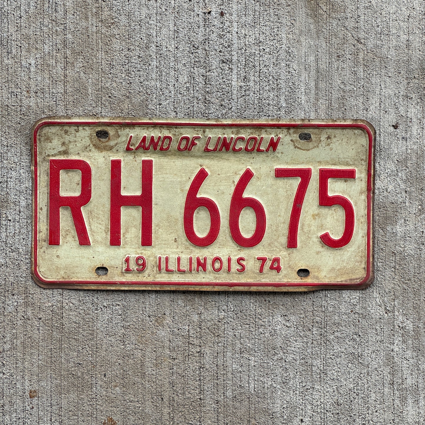 Photo of a 1974 Illinois License Plate Auto Tag Garage Decor Vintage RH 6675 with original patina