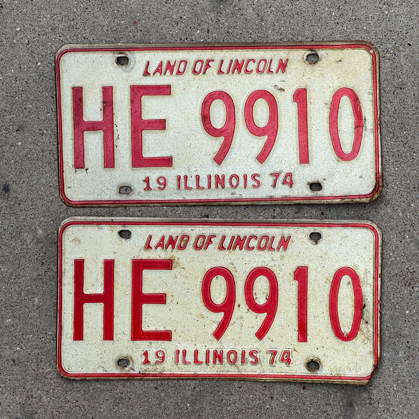 Photo of a 1974 Illinois License Plate Pair Auto Tag Garage Decor Vintage HE 9910 with original patina