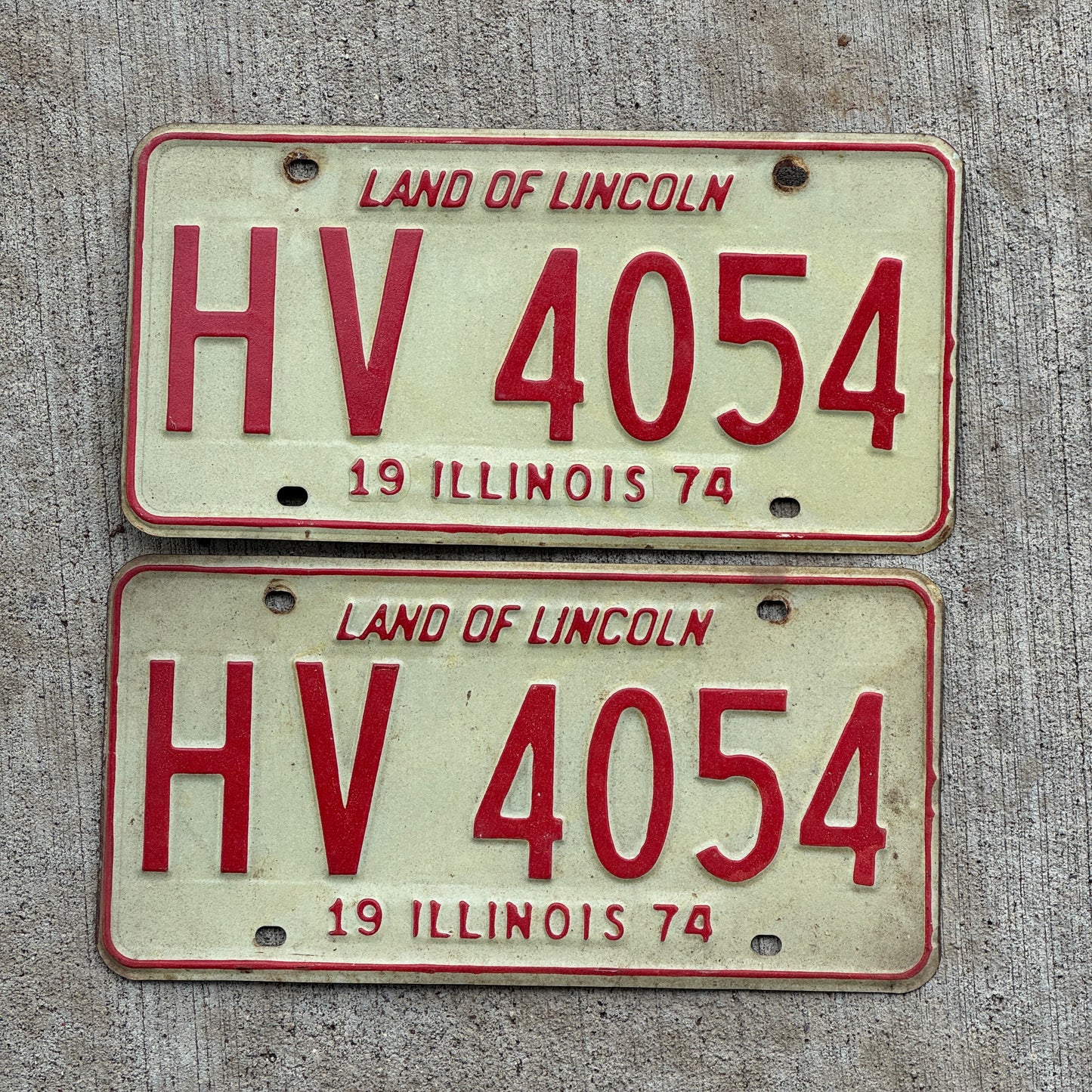 Photo of a 1974 Illinois License Plate Pair Auto Tag Garage Decor Vintage HV 4054 with original patina