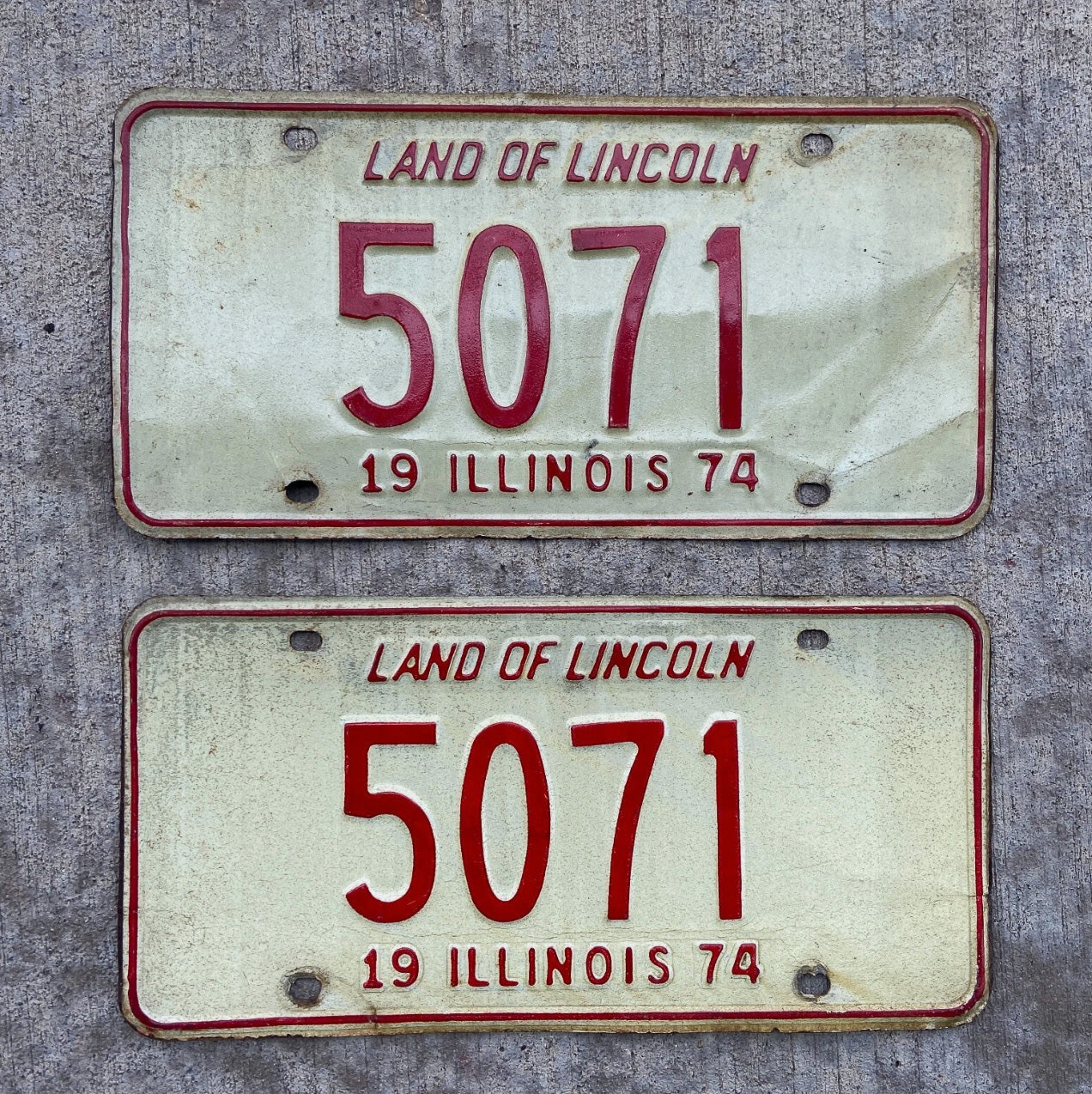 Photo of a 1974 Illinois License Plate Pair Auto Tag Garage Decor Vintage Low Number Four Digit 5071 with original patina