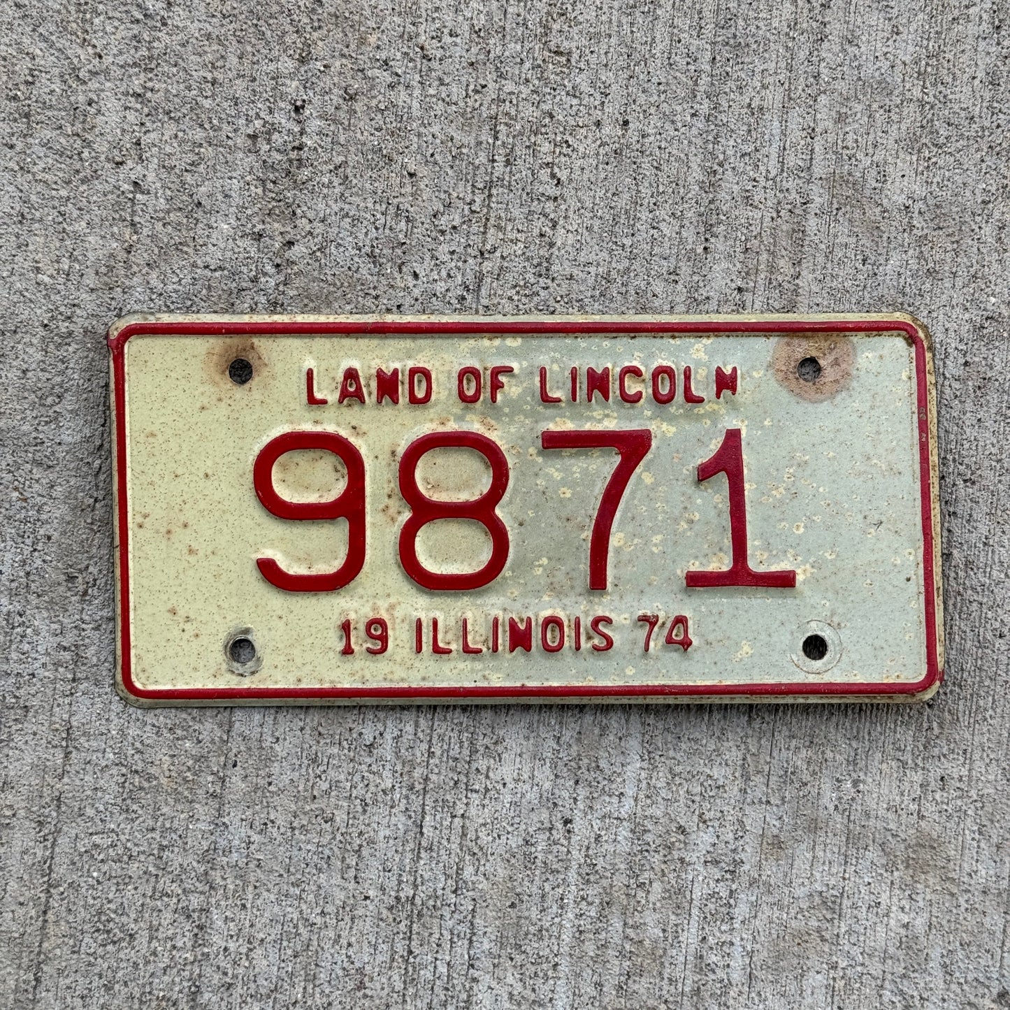 Photo of a 1974 Illinois MOTORCYCLE License Plate Auto Tag Garage Decor Vintage 9871