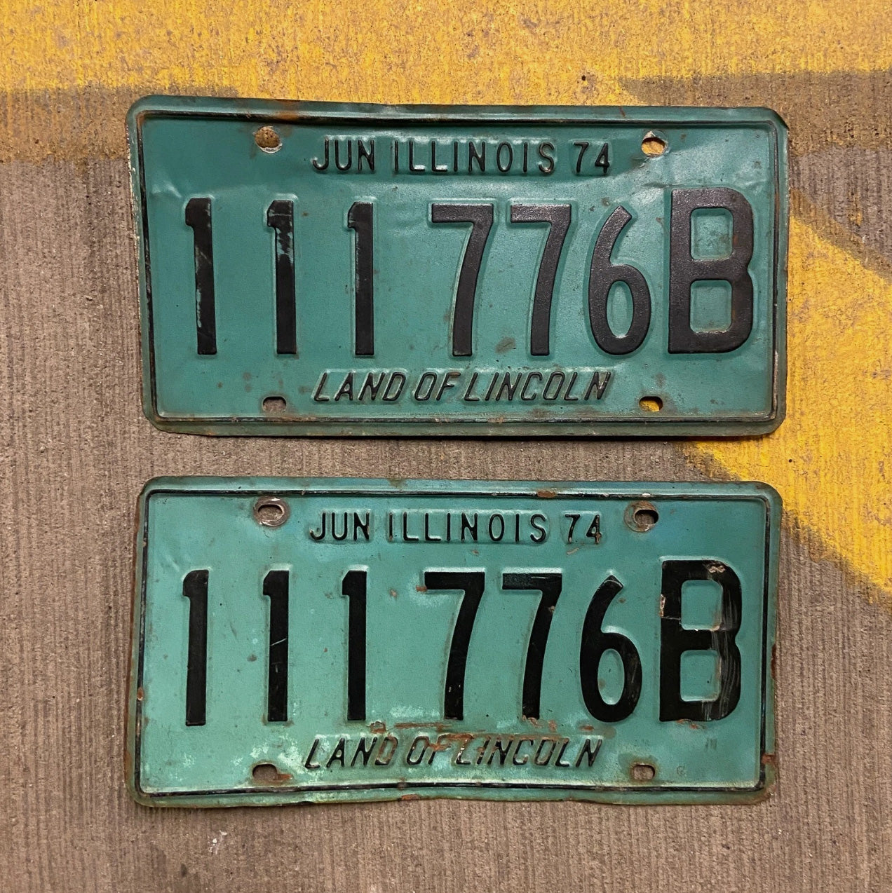 Photo of a 1974 Illinois Truck License Plate Pair Auto Tag Garage Decor Vintage Repeat Repeating 111 776 B with original patina