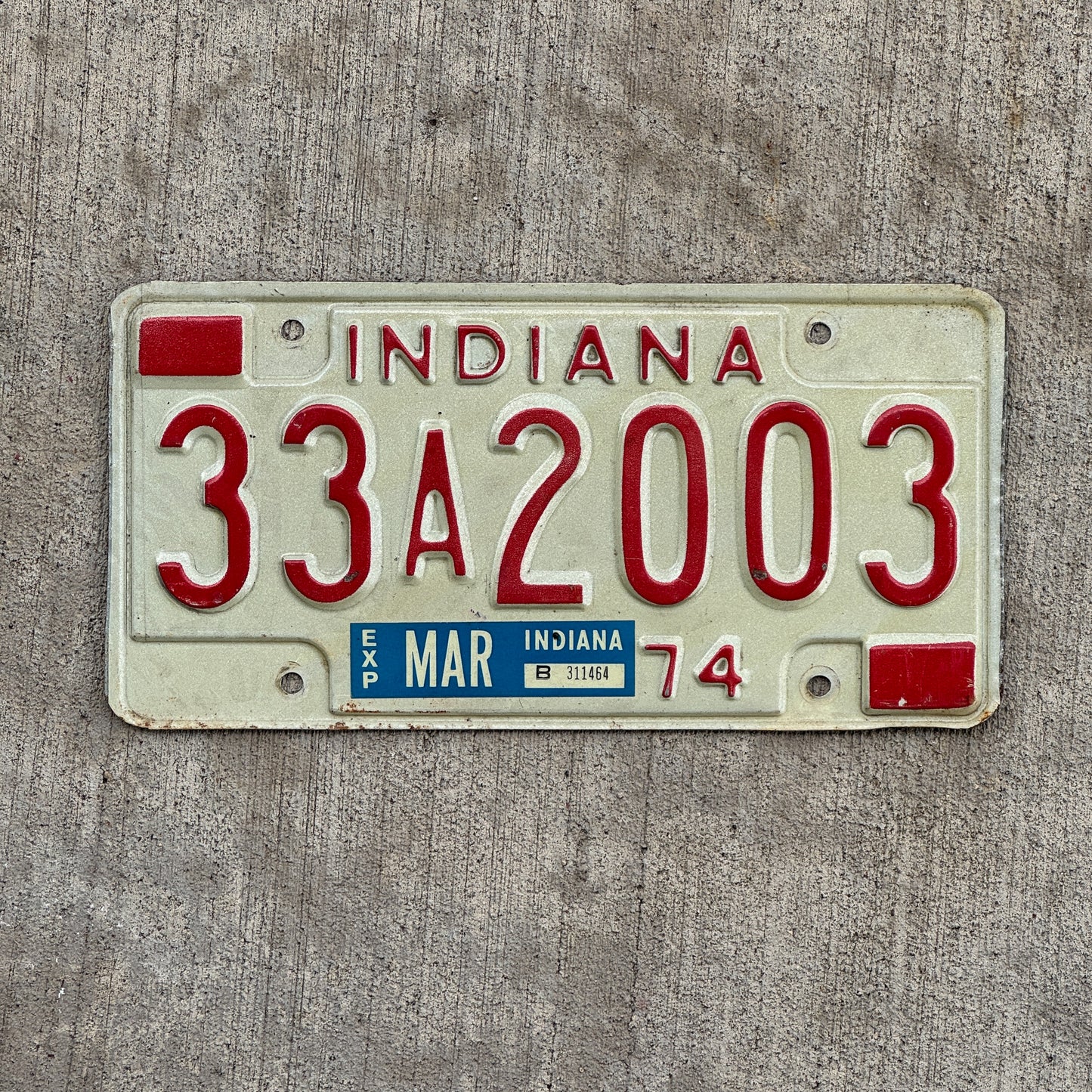 Photo of a 1974 Indiana License Plate Auto Tag Garage Decor Vintage Birth Year 33 A 2003 with original patina