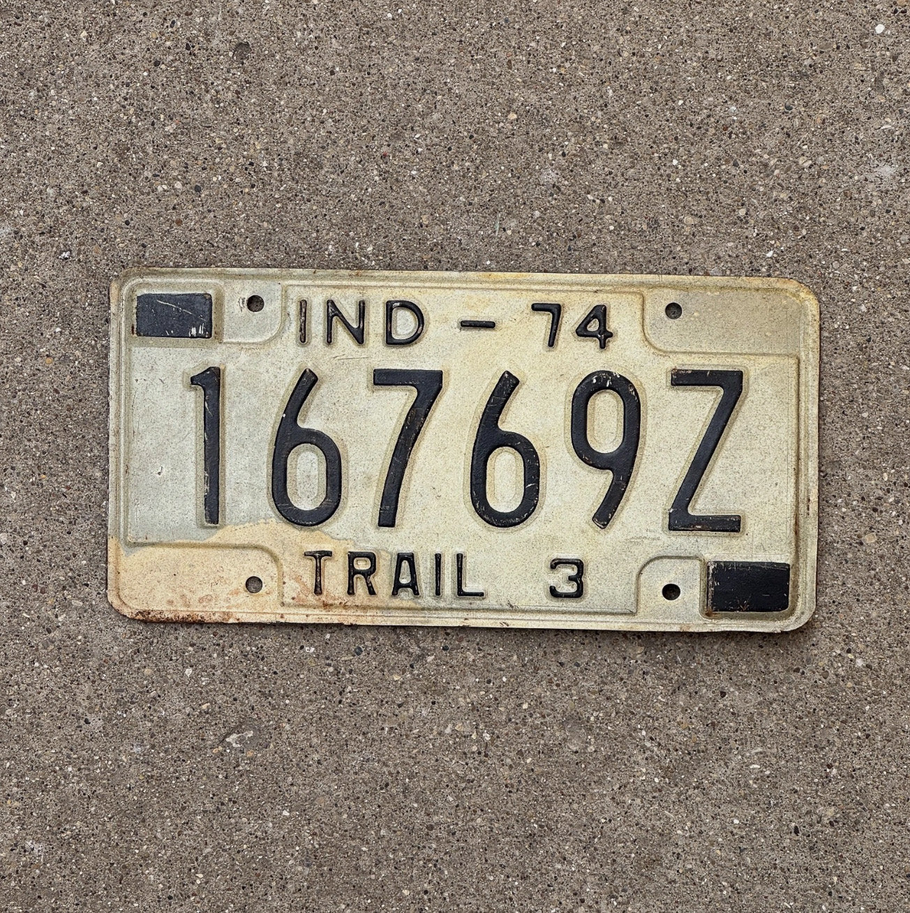 Photo of a 1974 Indiana Trailer License Plate Auto Tag Garage Decor 16769 Z