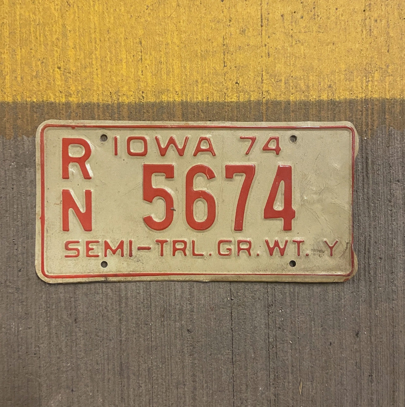 Photo of a 1974 Iowa Semi Trailer License Plate Auto Tag Garage Decor Vintage RN 5674