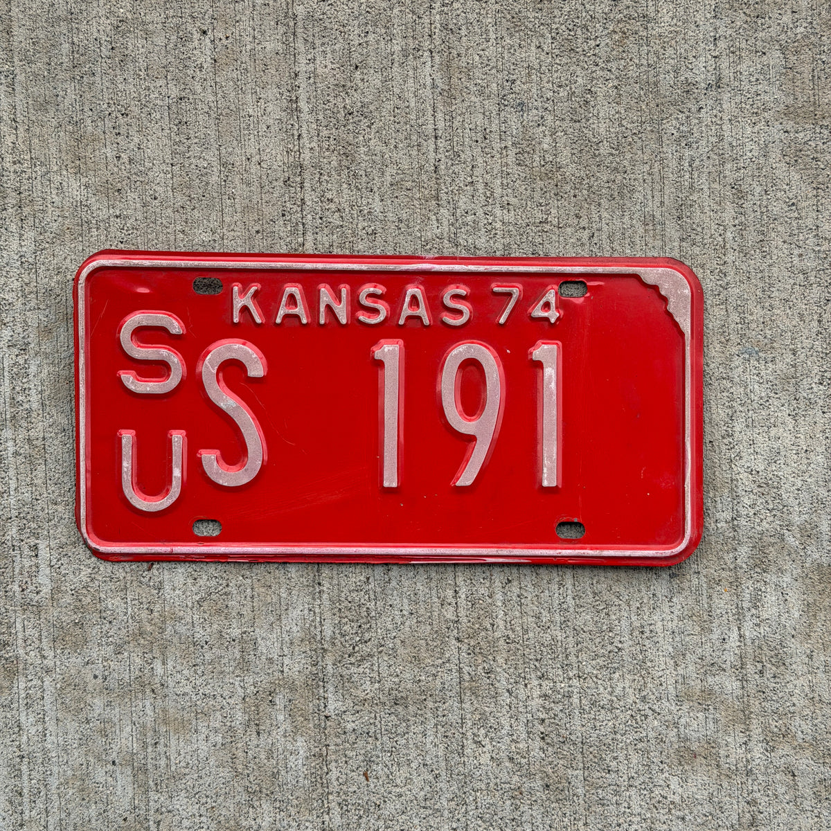 Photo of a 1974 Kansas License Plate Auto Tag Garage Decor Vintage SU S 191 with original patina