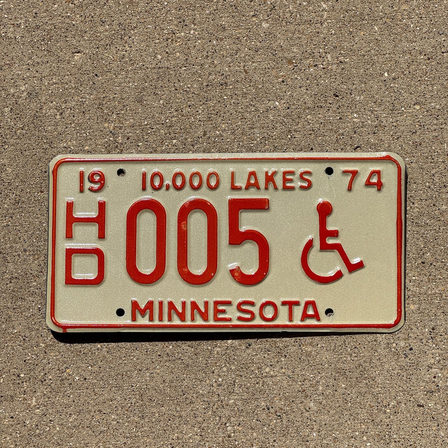Photo of a 1974 Minnesota Handicapped License Plate Auto Tag 1 Garage Decor Low Number Single Digit HD 005
