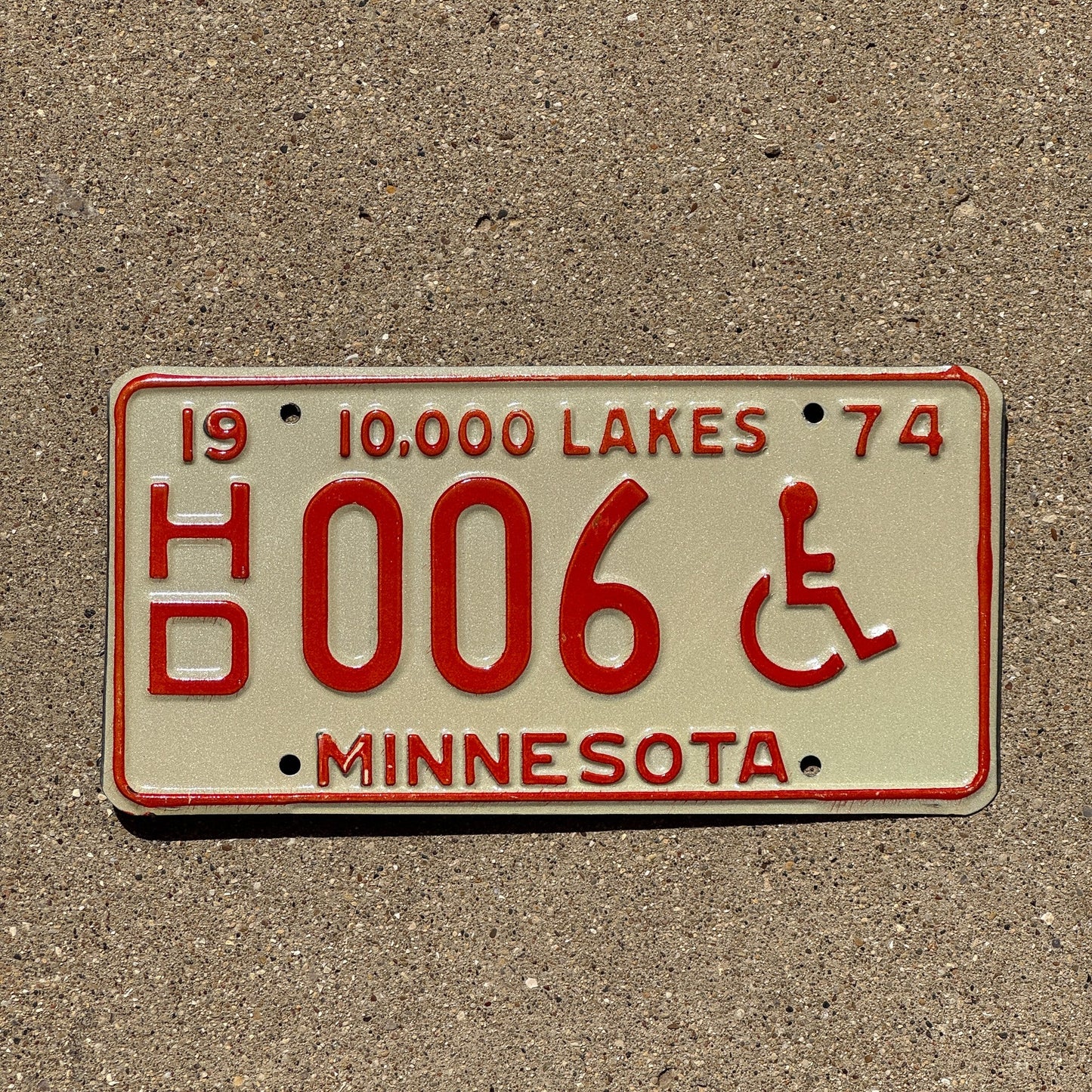 Photo of a 1974 Minnesota Handicapped License Plate Auto Tag 1 Garage Decor Low Number Single Digit HD 006