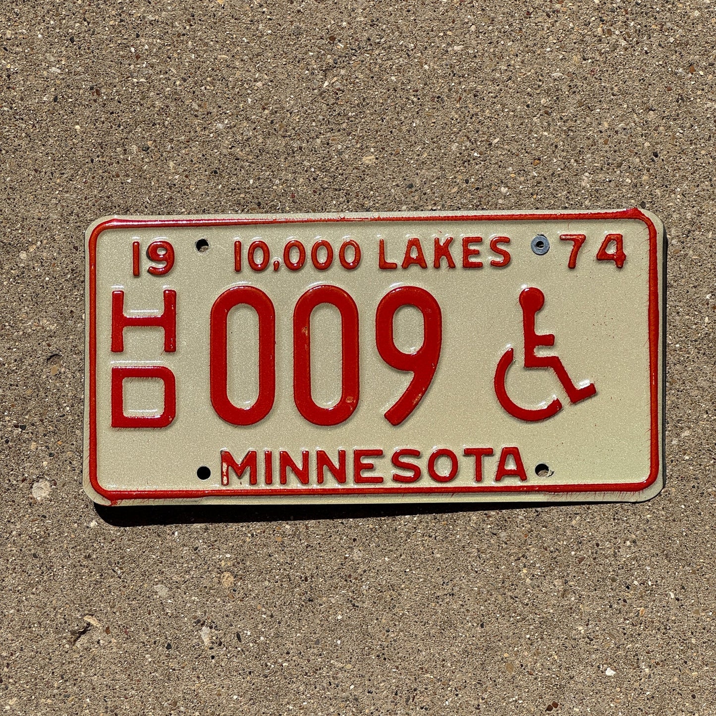 Photo of a 1974 Minnesota Handicapped License Plate Auto Tag 1 Garage Decor Low Number Single Digit HD 009