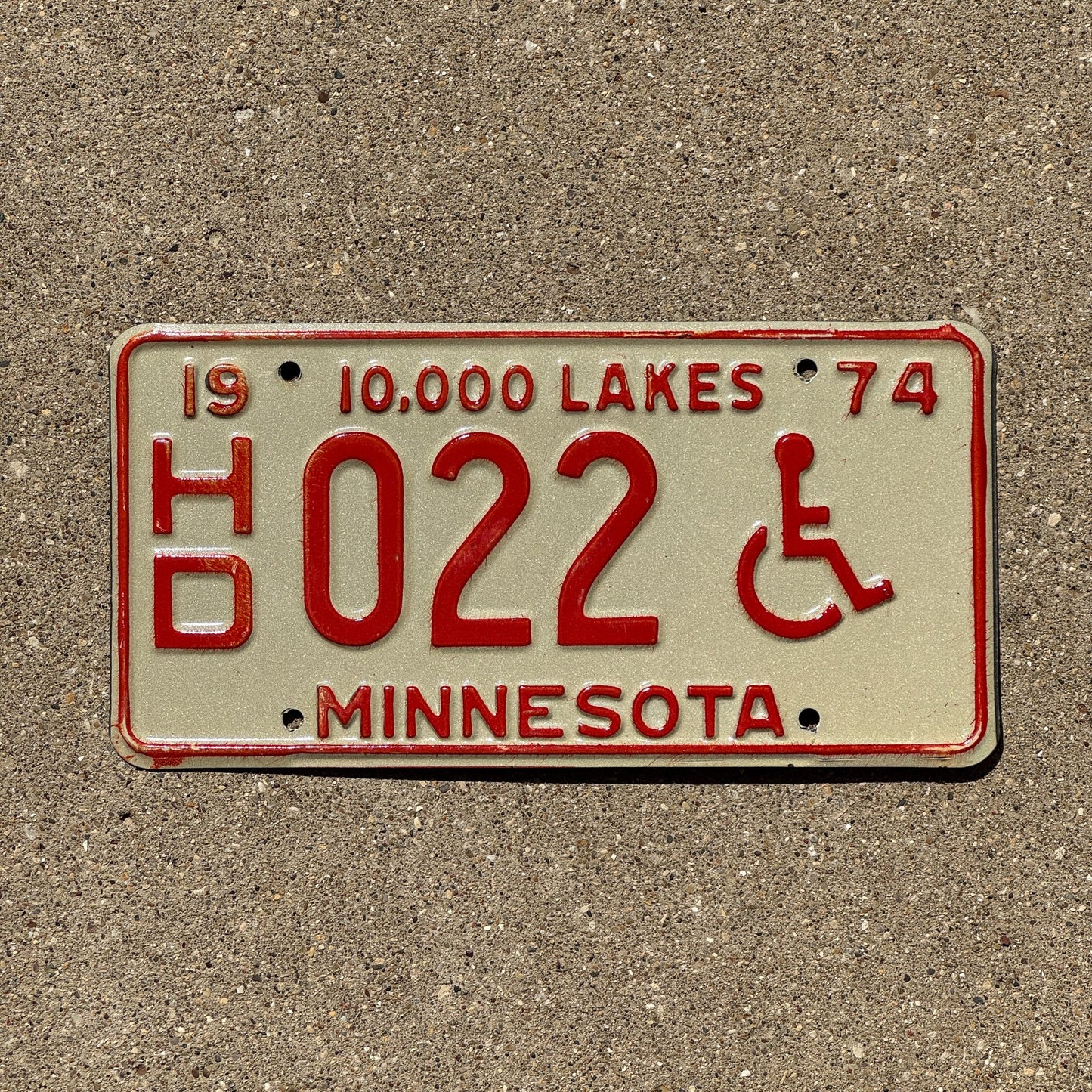 Photo of a 1974 Minnesota Handicapped License Plate Auto Tag 1 Garage Decor Low Number Two Digit HD 022