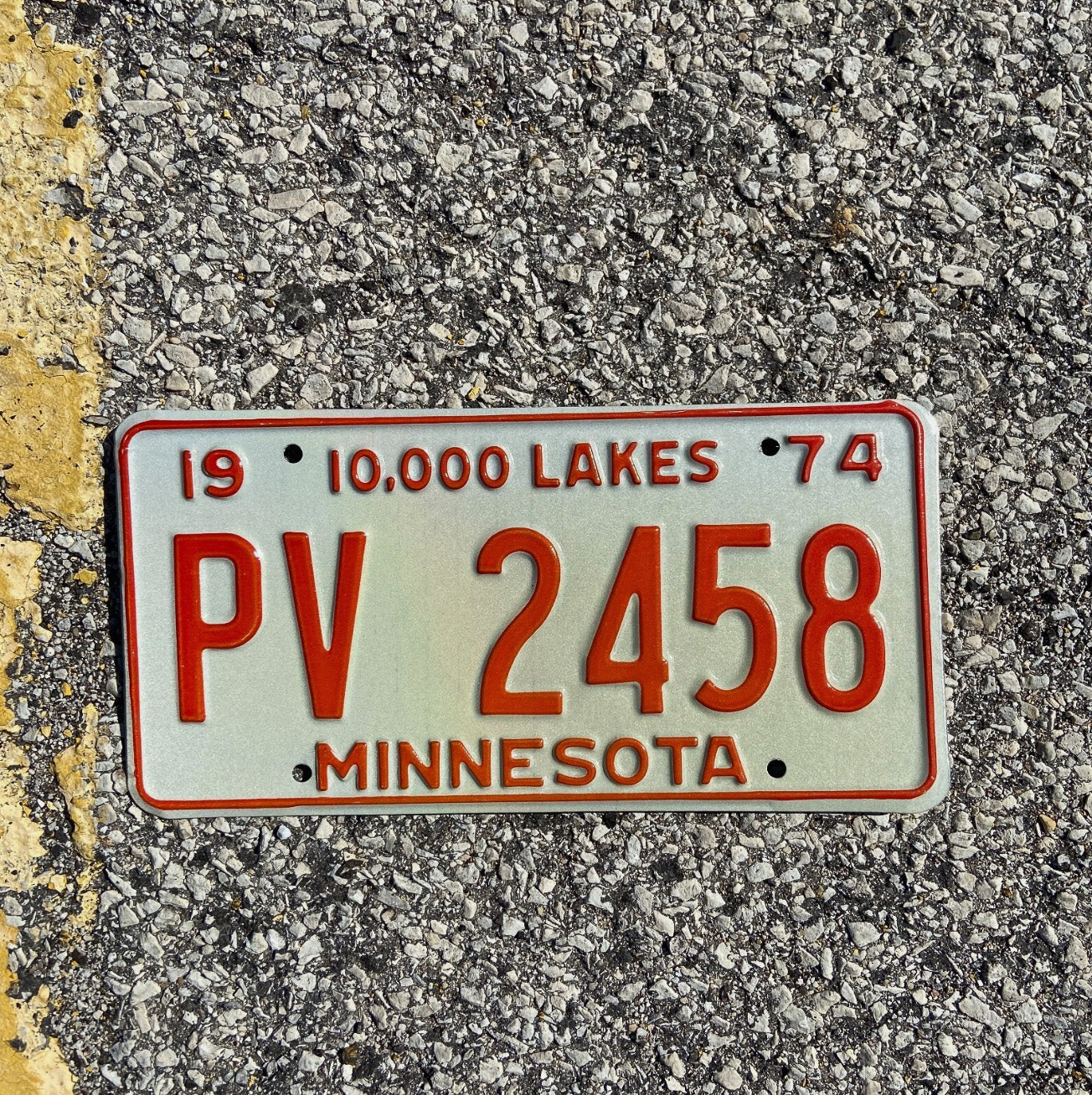 Photo of a 1974 Minnesota License Plate Auto Tag 2 Garage Decor PV 2458