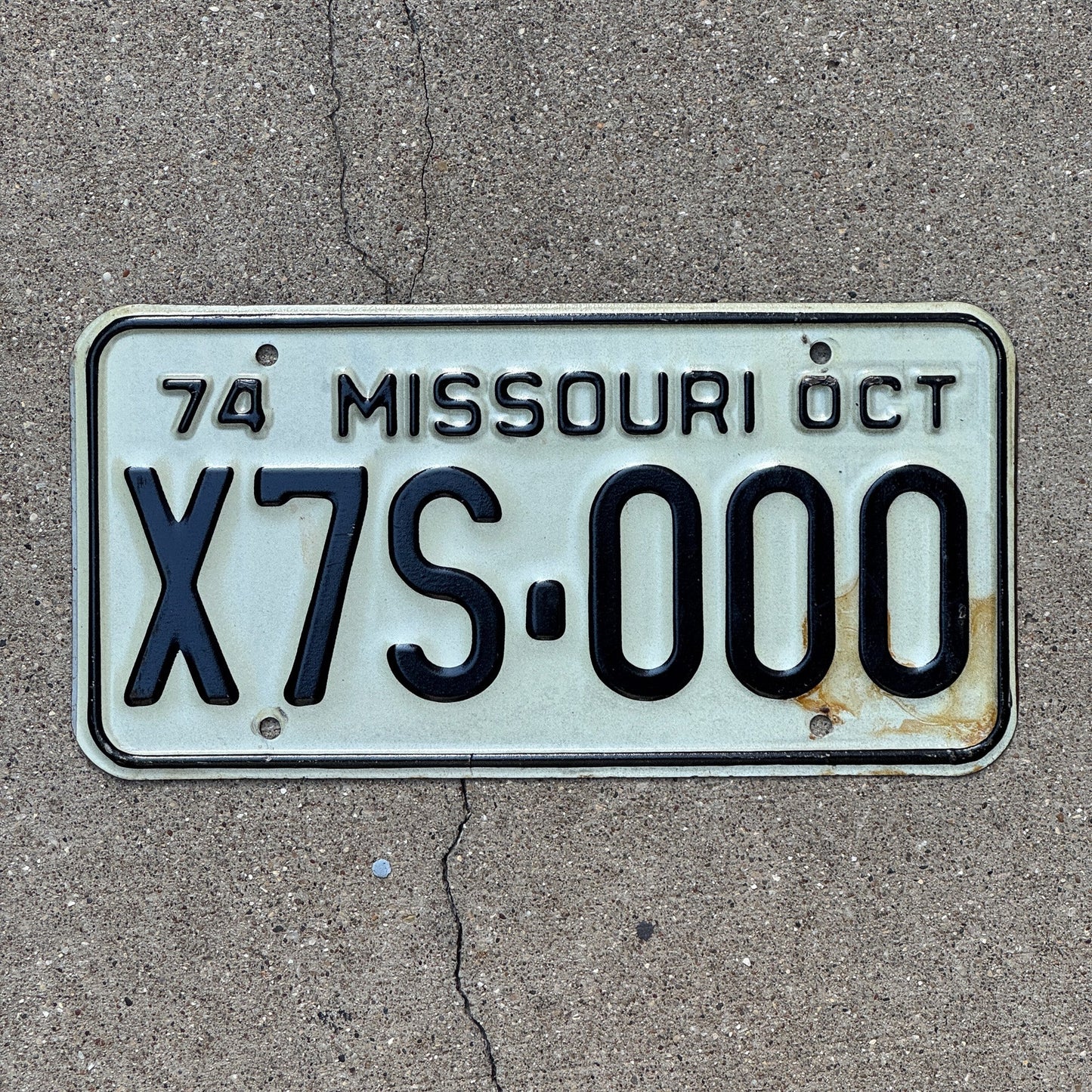 Photo of a 1974 Missouri License Plate Auto Tag 1 Garage Decor Fun Number X7S 000