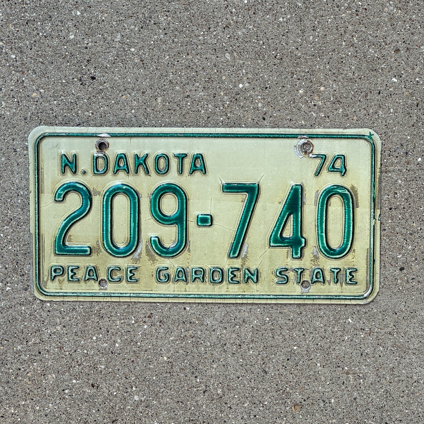 Photo of a 1974 North Dakota License Plate Auto Tag Garage Decor Vintage 209 740