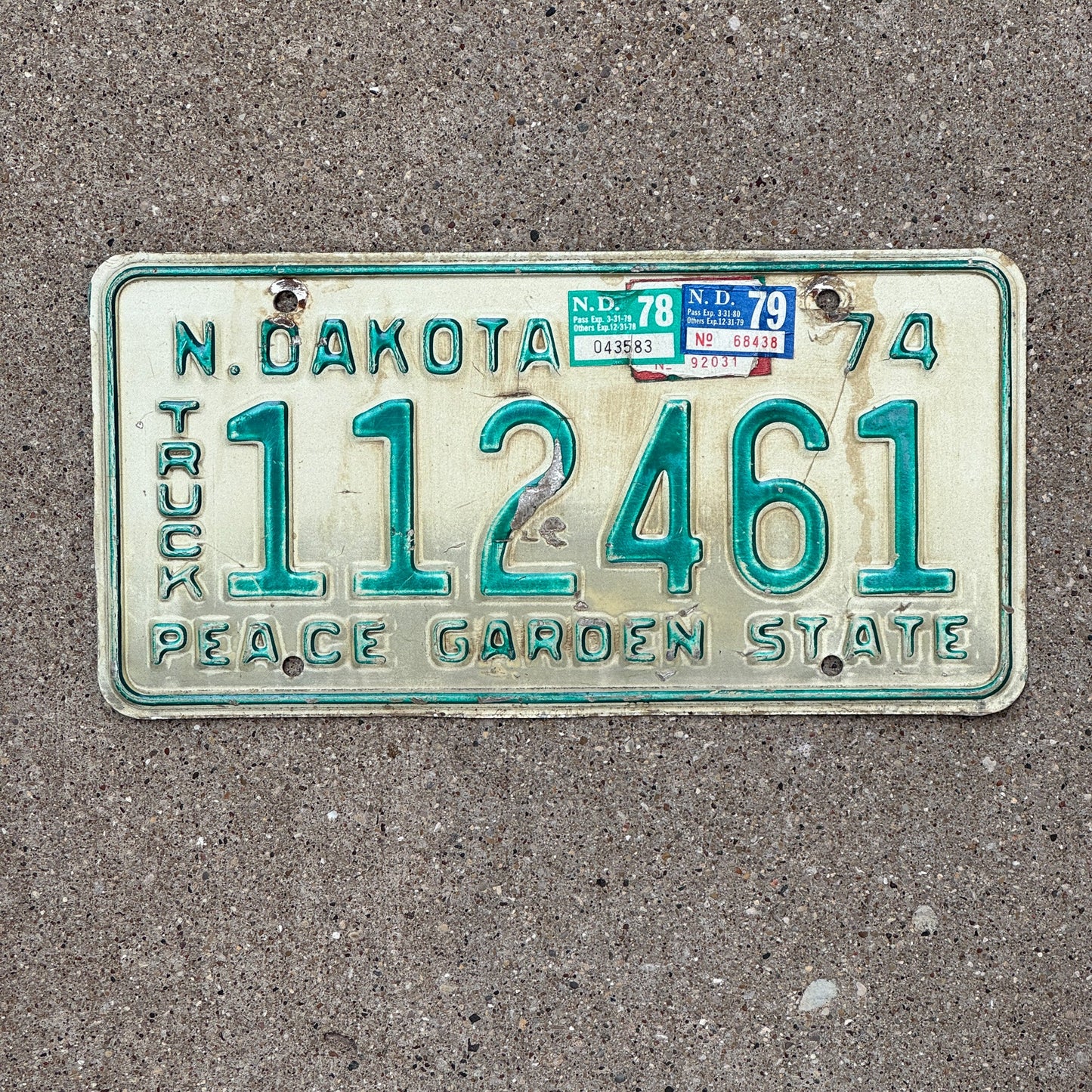Photo of a 1974 North Dakota TRUCK License Plate Auto Tag Garage Decor Vintage 112461