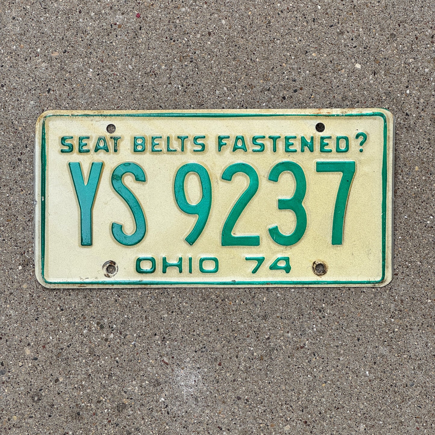 Photo of a 1974 Ohio License Plate Auto Tag Garage Decor Vintage YS 9237 with original patina