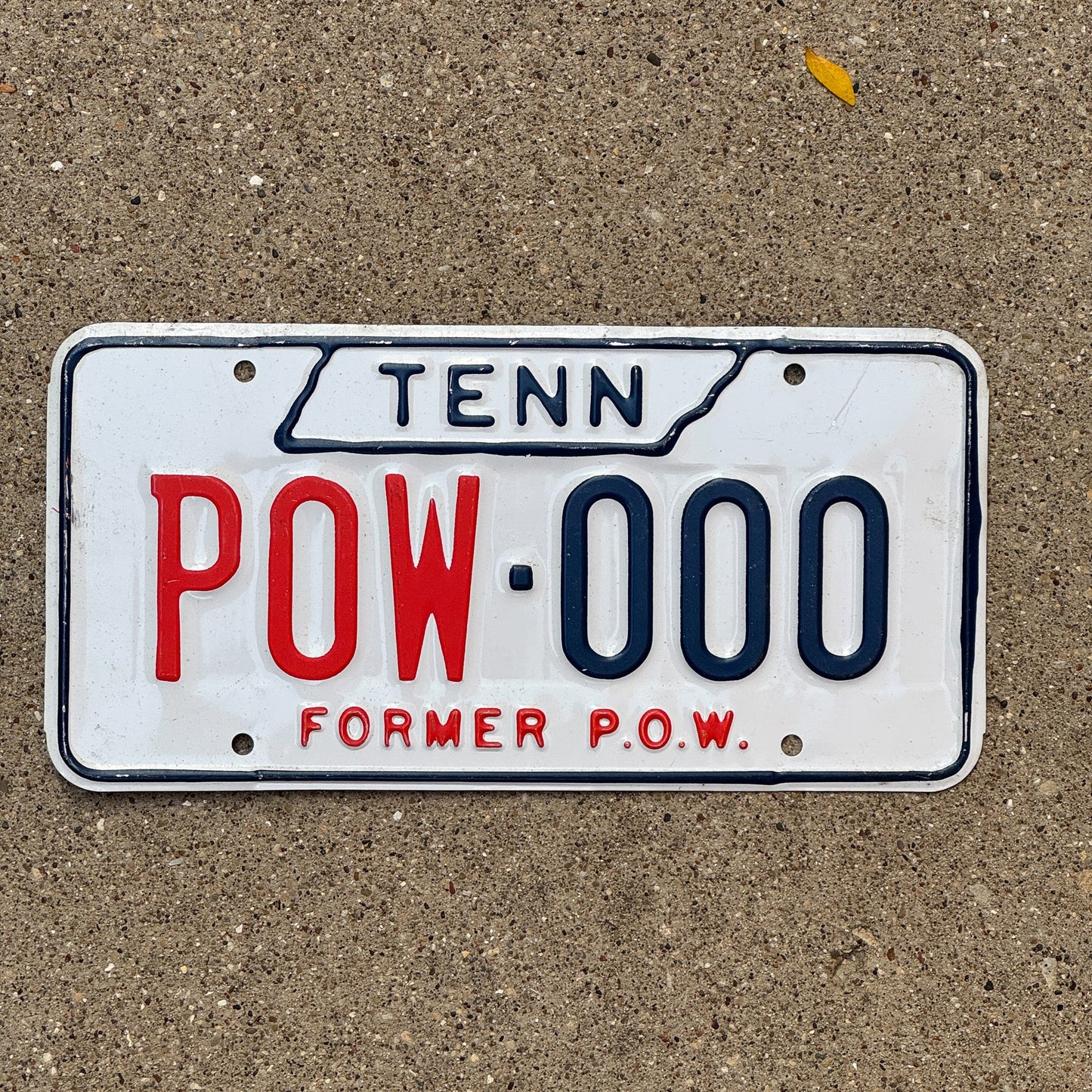 Photo of a 1974 Tennessee Prisoner of War License Plate Auto Tag Garage Decor Vintage POW 000