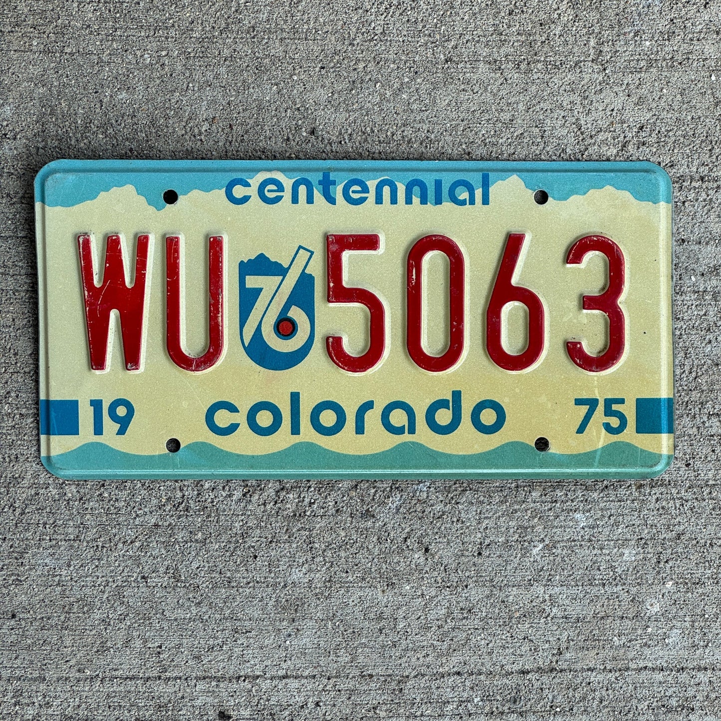 Photo of a 1975 1976 Colorado License Plate Auto Tag Garage Decor Vintage WU 5063