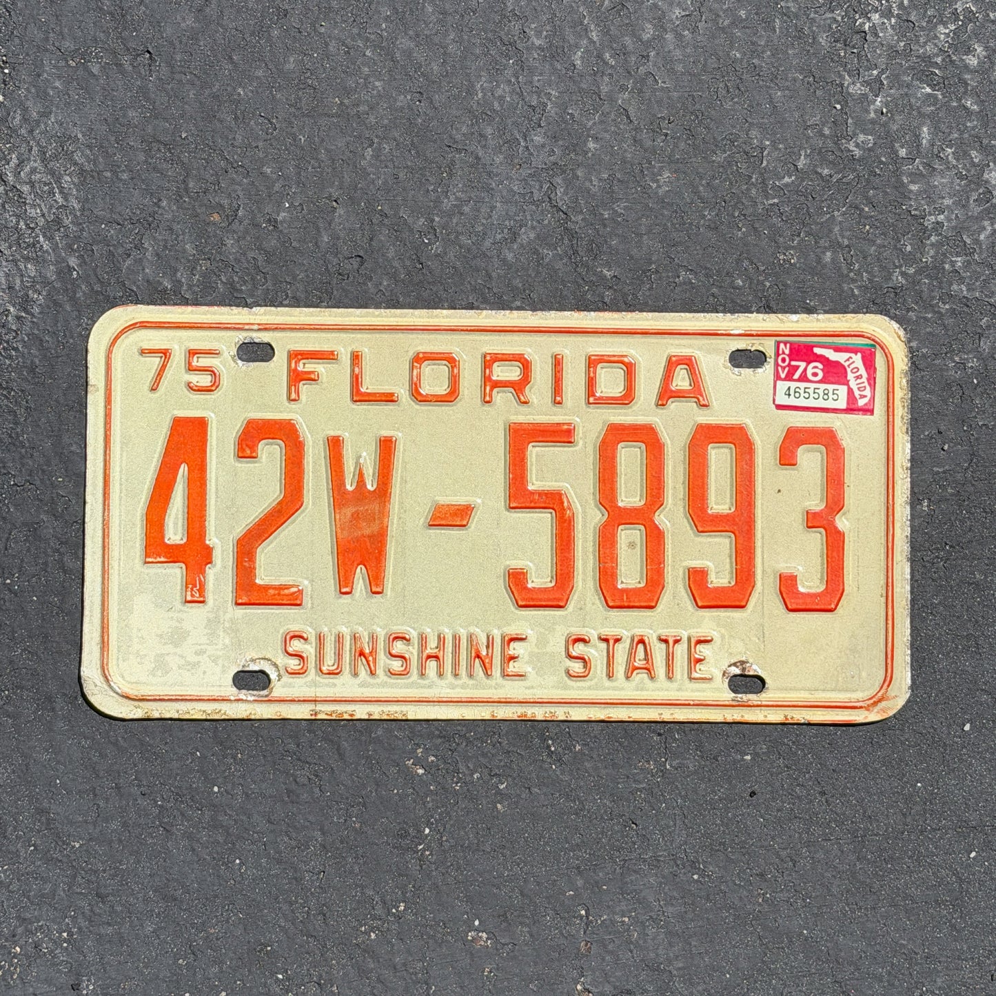 Photo of a 1975 1976 Florida License Plate Auto Tag Garage Decor Vintage 42W 5893 with original patina