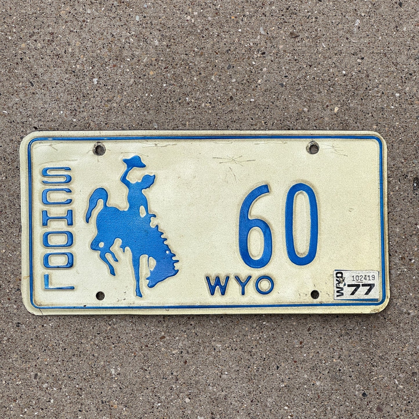 Photo of a 1975 1977 Wyoming SCHOOL BUS License Plate Auto Tag Garage Decor Vintage 60