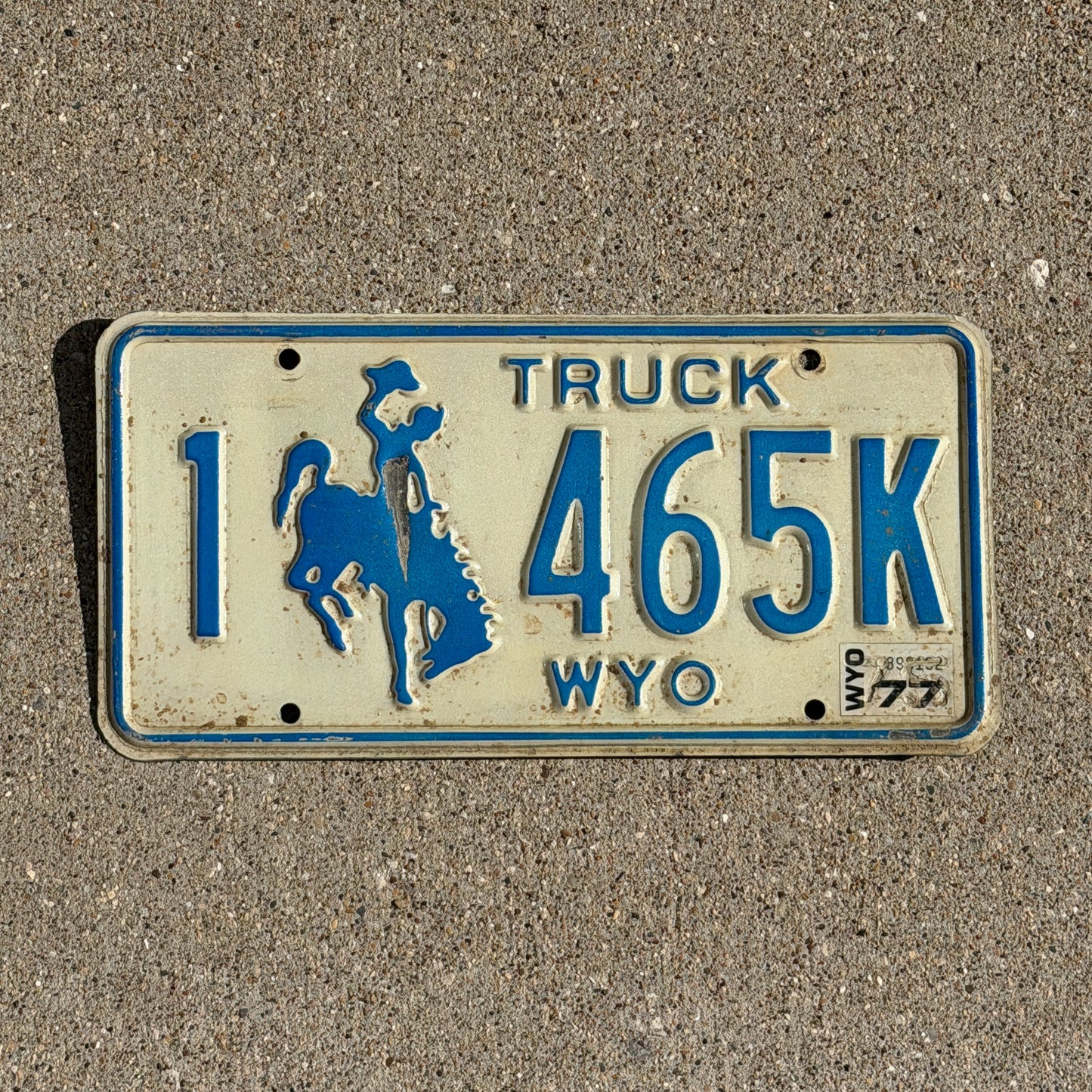 Photo of a 1975 1977 Wyoming Truck License Plate Auto Tag Garage Decor Vintage Cowboy Rodeo 1 465 K with original patina