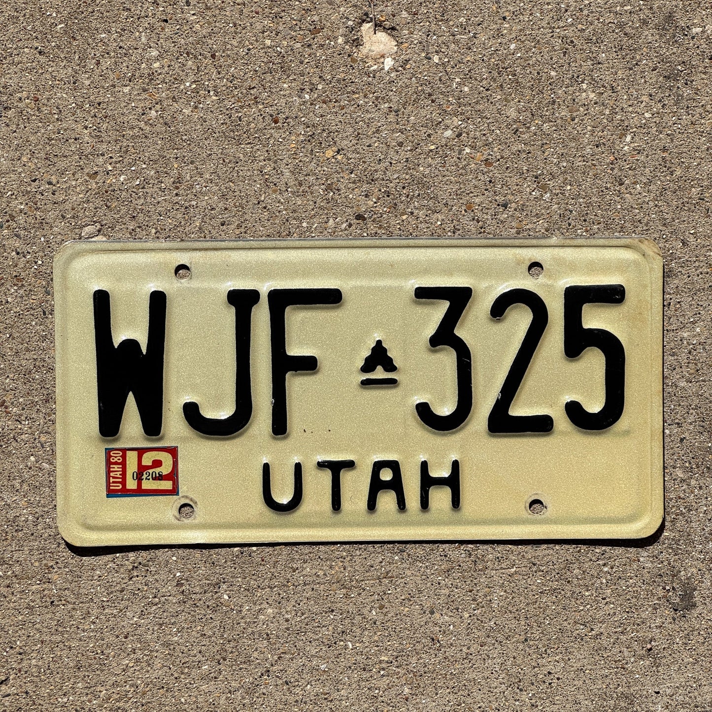Photo of a 1975 1980 Utah License Plate Auto Tag Garage Decor Vintage Beehive Bees WJF 325