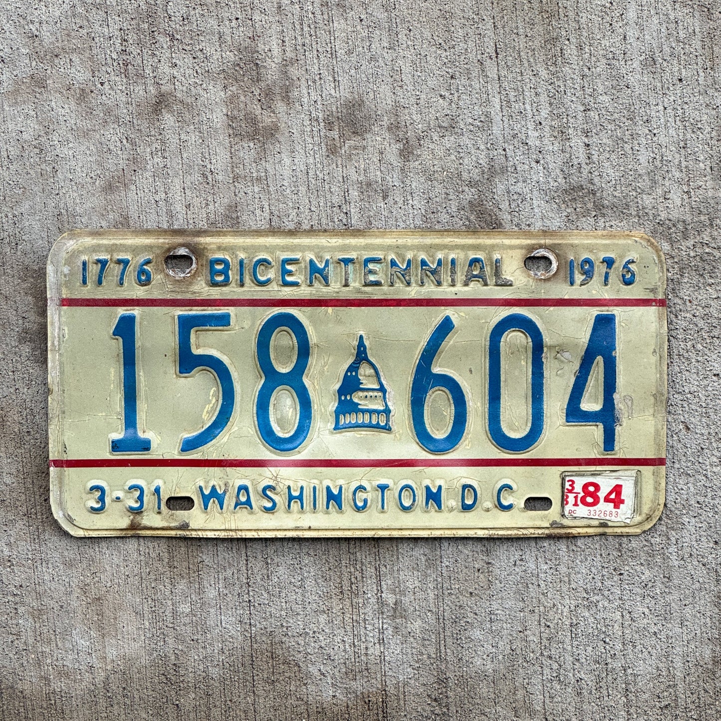 Photo of a 1975 1984 Washington DC License Plate Auto Tag 2 Vintage Garage Capitol Bicentennial 158 604 with original patina