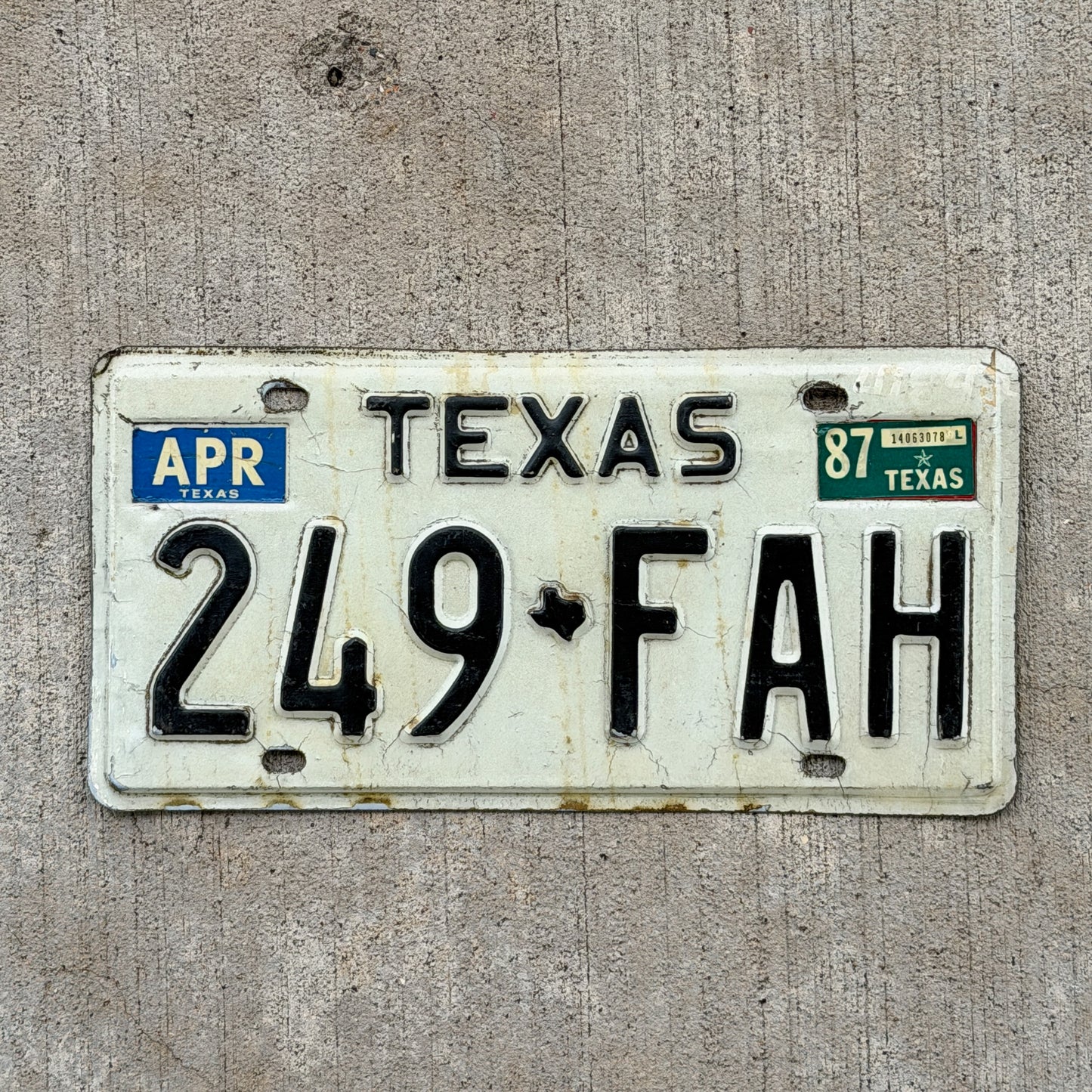 Photo of a 1975 1987 Texas License Plate Auto Tag Garage Decor Vintage 249 FAH with original patina