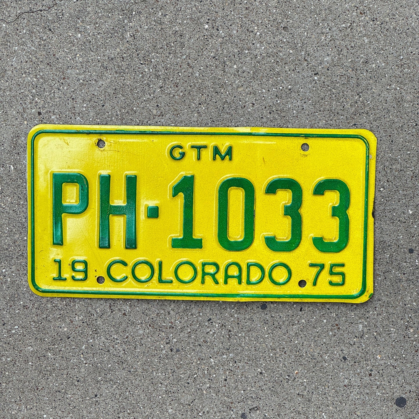 Photo of a 1975 Colorado GTM License Plate Auto Tag Garage Decor Vintage PH 1033