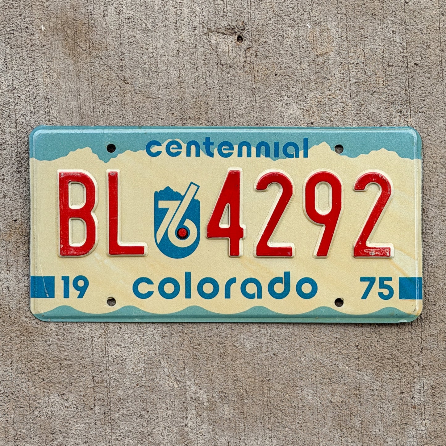 Photo of a 1975 Colorado License Plate Auto Tag Garage Decor Vintage Bicentennial BL 4292 with original patina